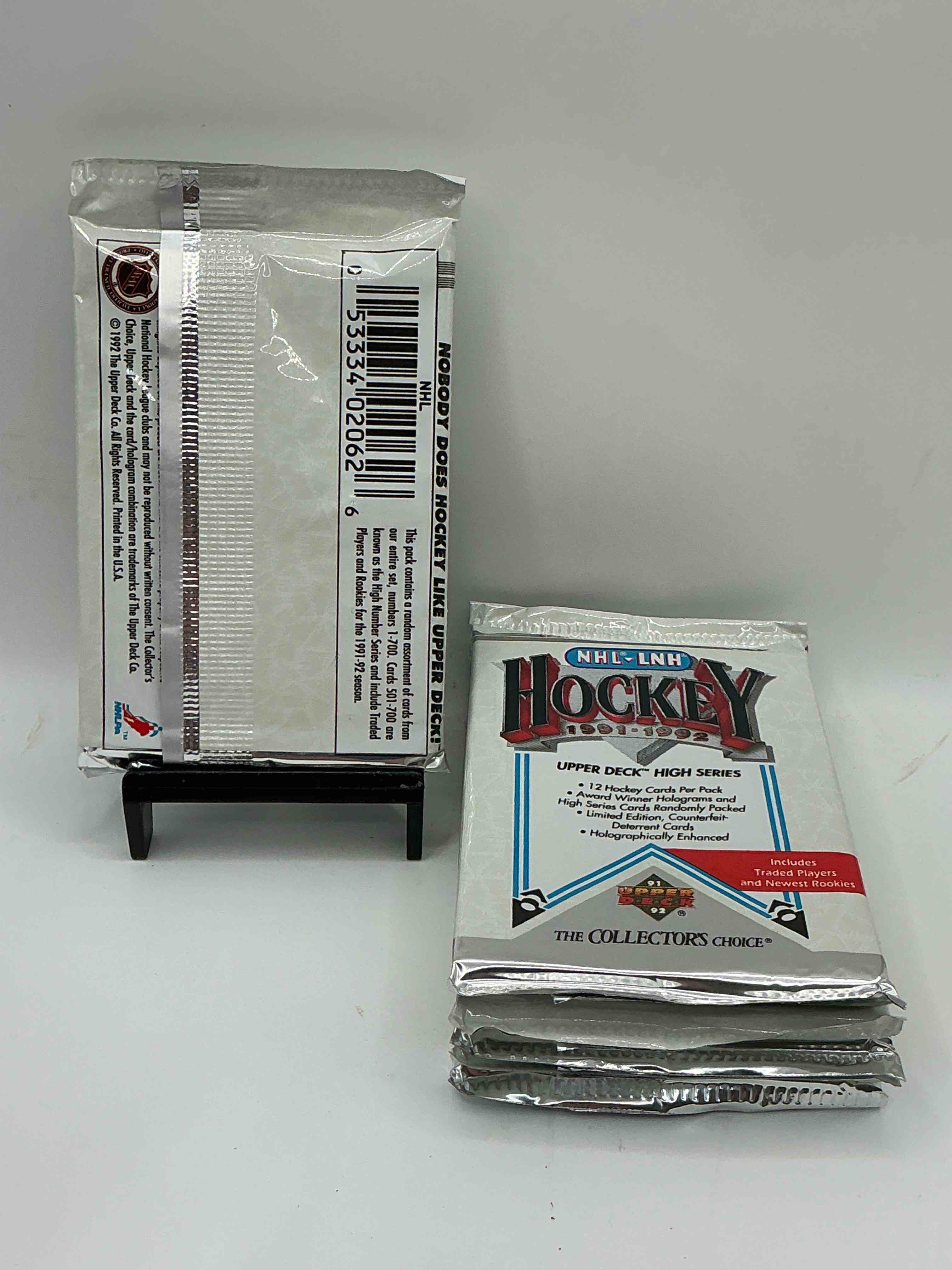 Condition photo showing New/Like New for Wow! 1991-92 NHL Upper Deck High Series Hockey Packs! Look for All Of Your Favorite Stars From The 90’s In These Rare Packs!