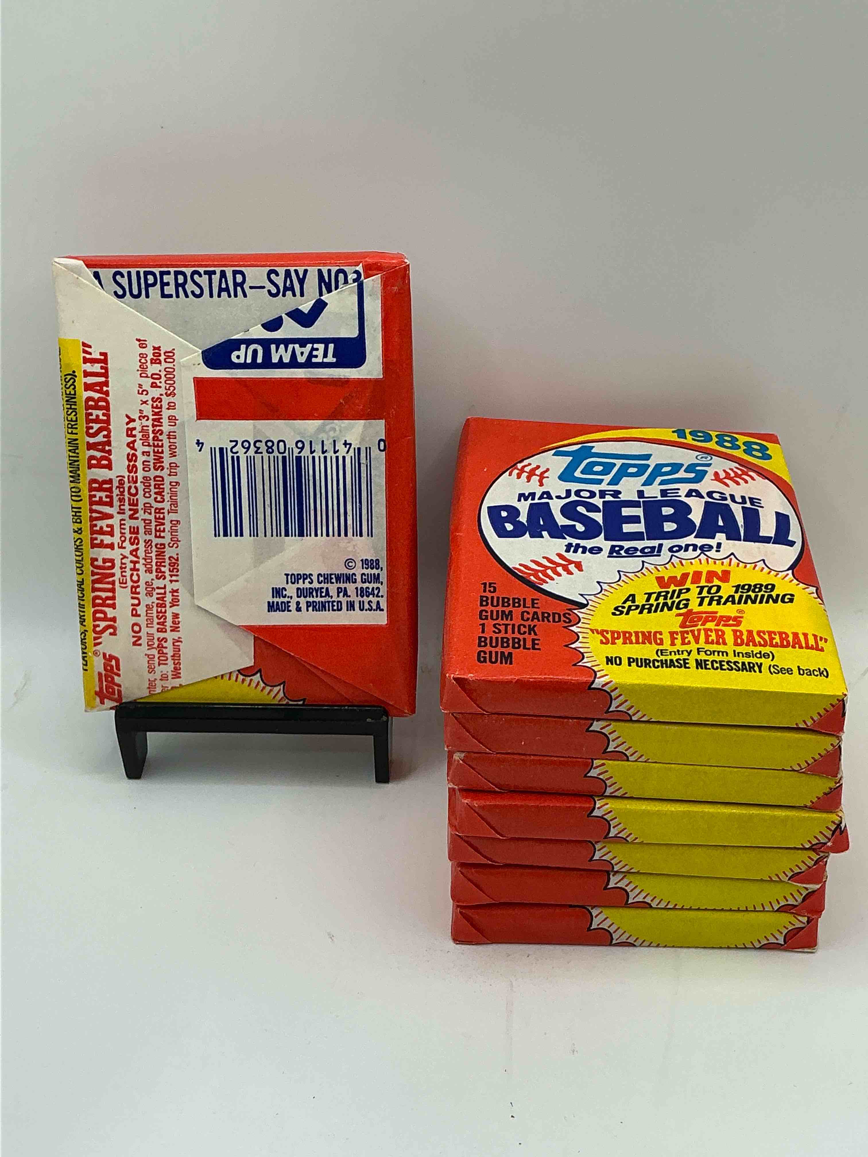 Condition photo showing New/Like New for 80's Baseball Fan's Rejoice! 1988 Topps Baseball Unopened Wax Packs Full Of Collectible Trading Cards! Search For Valuable Don Mattingly "World Of Baseball" & Nolan Ryan Cards Worth Hundreds In Perfect Condition!