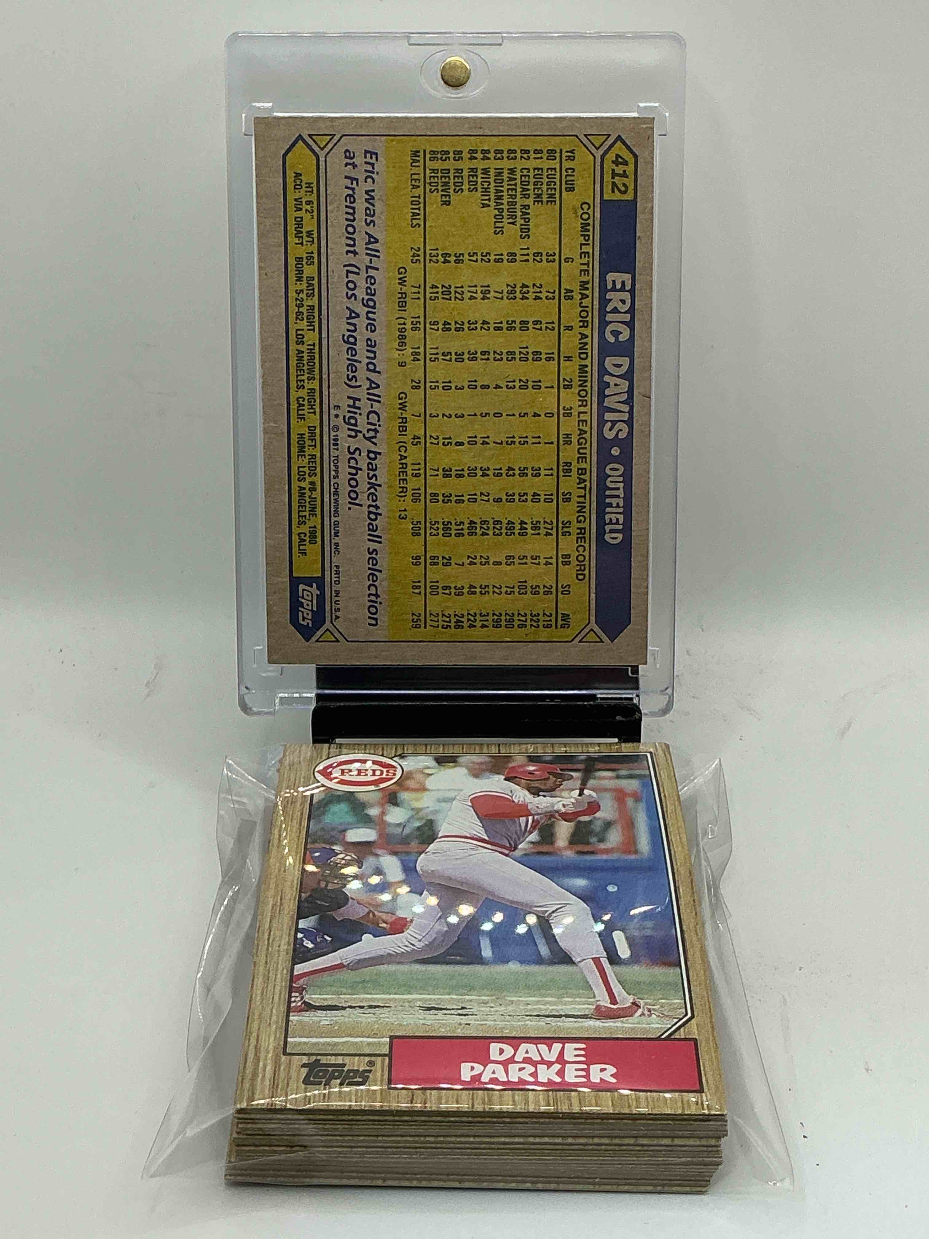 Condition photo showing New/Like New for 1987 Topps Baseball REDS Set! Card Reds Set, Including Pete Rose Card! Legends Like Pete Rose, Eric Davis & So Many More! Perfect For Any Reds Fan! These Cards Are Rare & Hard To Come By!