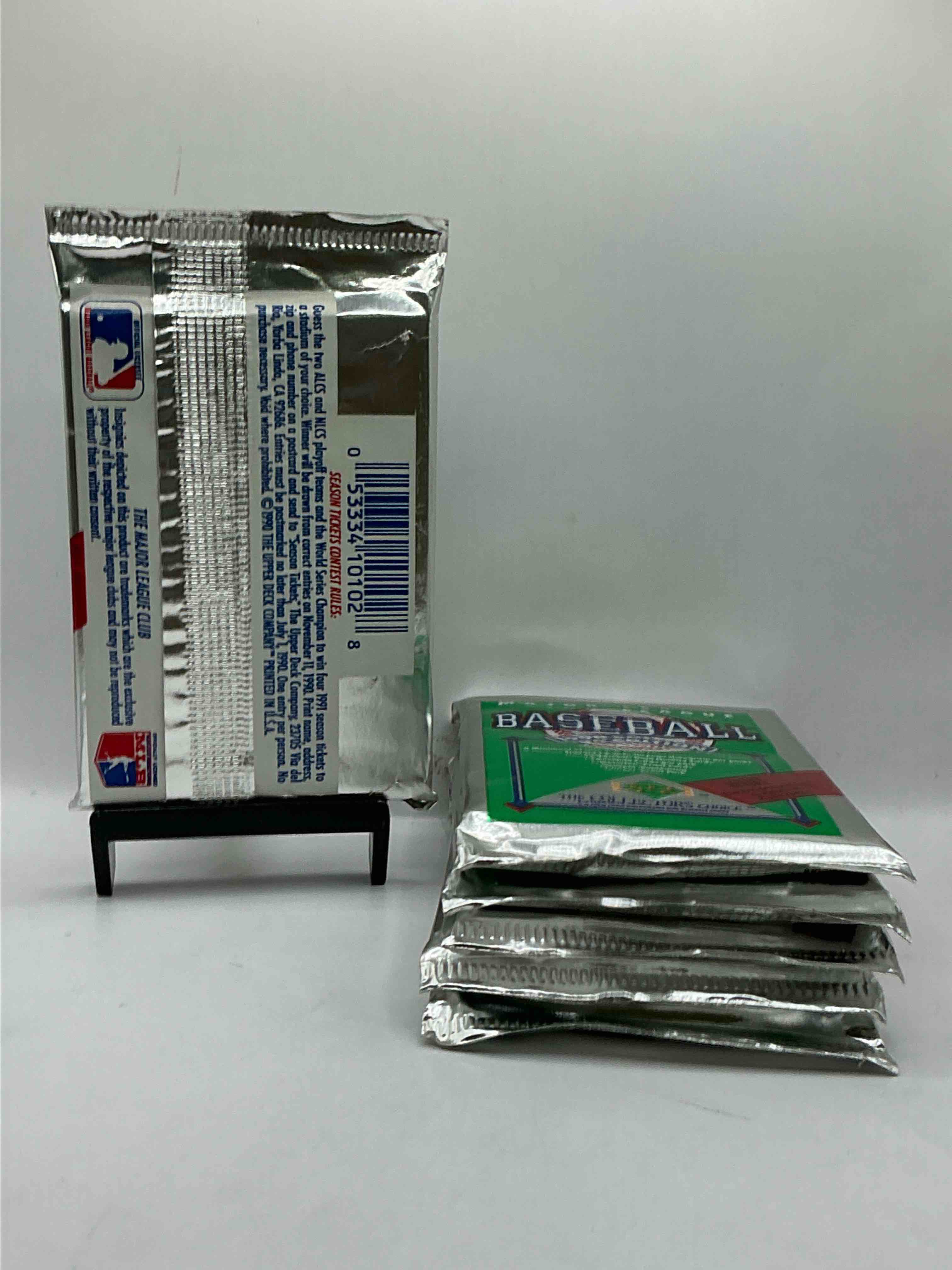 Condition photo showing New/Like New for 1990 Upper Deck Baseball Unopened Sports Trading Card Packs! Direct From Original Box! Look For Possible Collector's 3D Team Logo Card! As Well As Early Ken Griffey Jr. Cards!