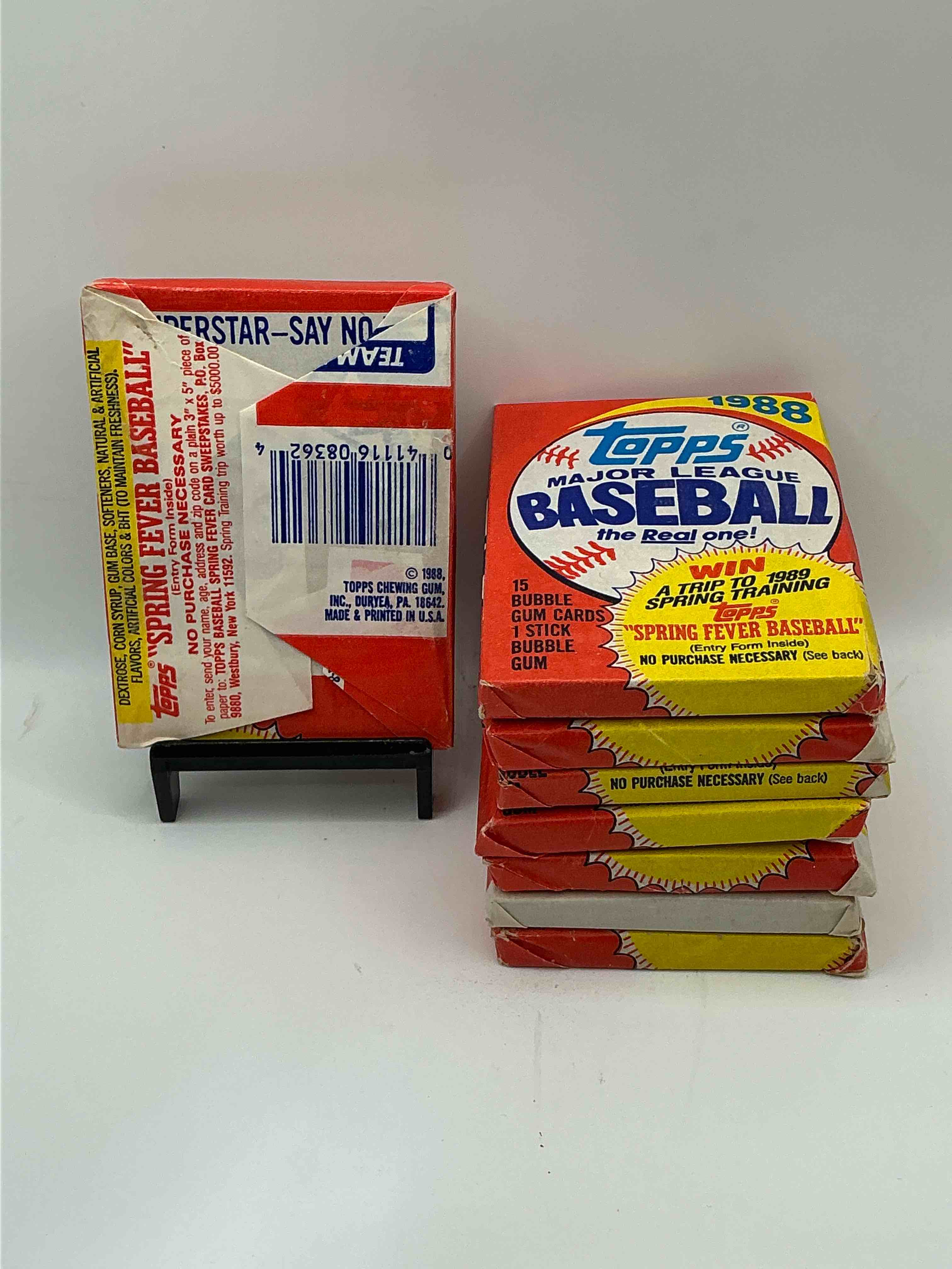Condition photo showing New/Like New for 80's Baseball Fan's Rejoice! 1988 Topps Baseball Unopened Wax Packs Full Of Collectible Trading Cards! Search For Valuable Don Mattingly "World Of Baseball" & Nolan Ryan Cards Worth Hundreds In Perfect Condition!