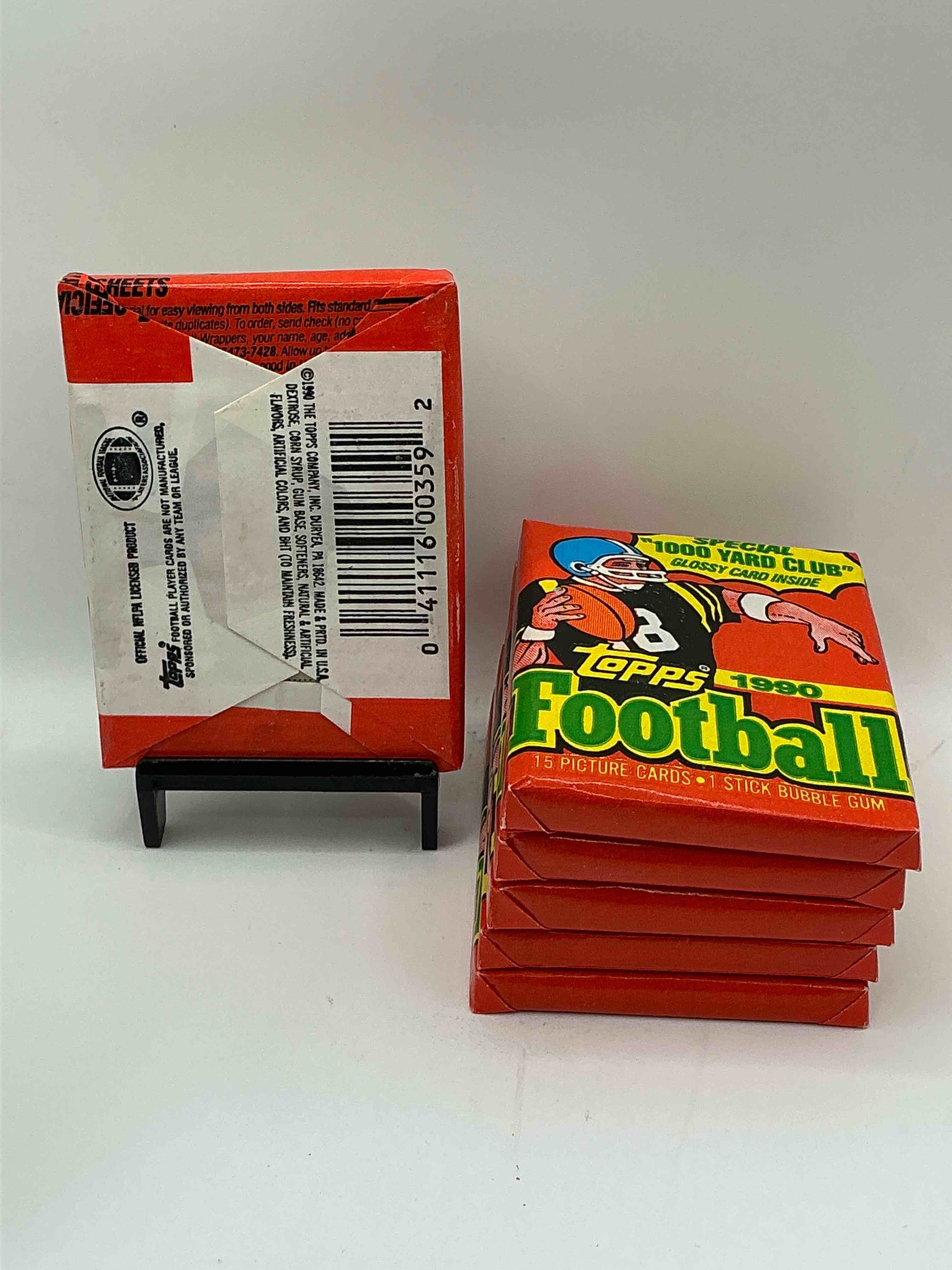 Condition photo showing New/Like New for The Last Year Of Football Wax! Joe Montana, Emmitt Smith & Barry Sanders!? 1990 Topps Football Unopened Sports Card Wax Pack, Direct From Original Retail Box! Getting Hard To Find! Search For Early Barry Sanders & Jerry Rice & So Much More!