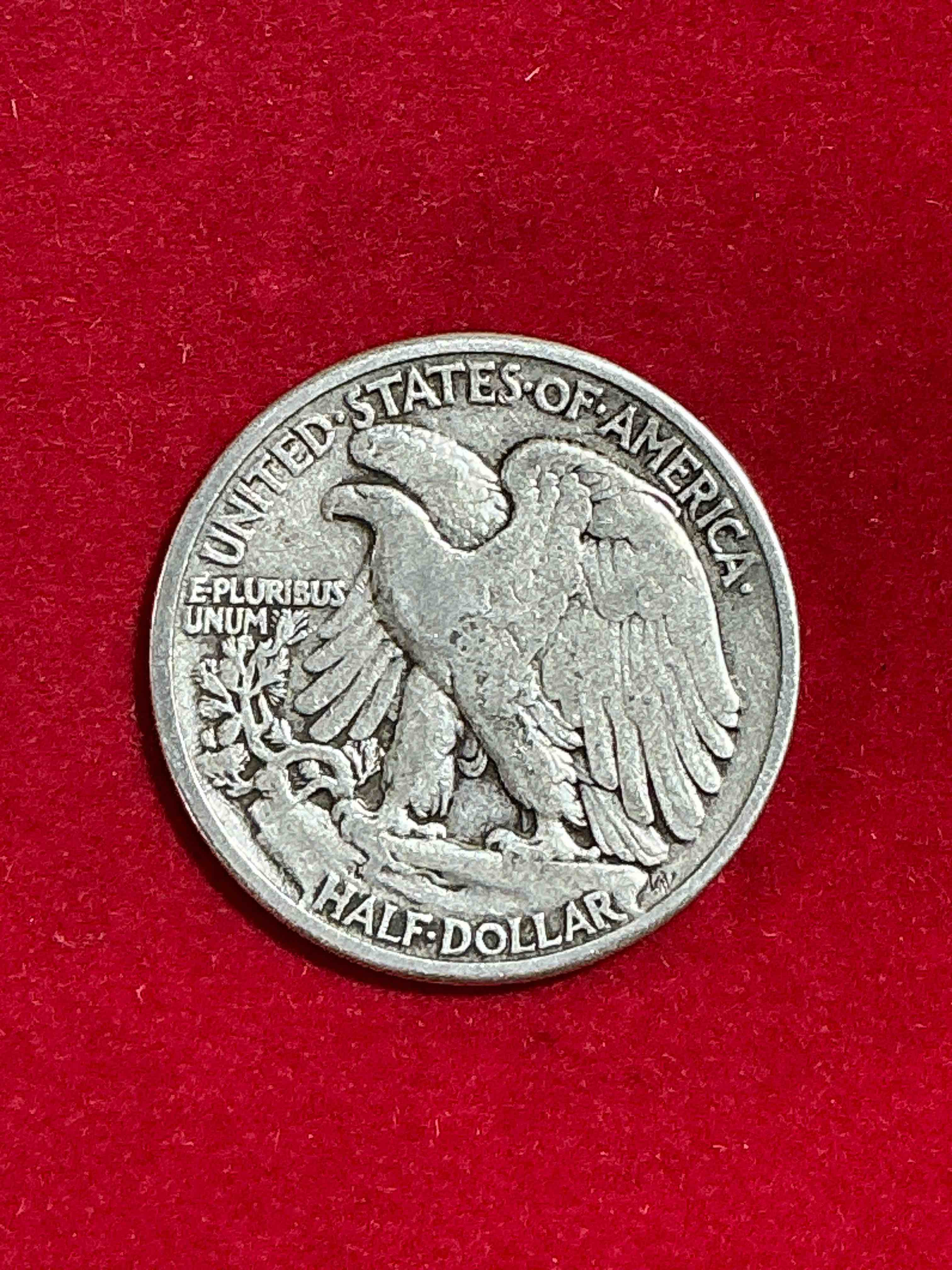 Condition photo showing Good Condition for World War II Era Silver! Antique U.S. Silver! Liberty Walking Silver Fine U.S. Silver Half Dollar! This Striking Half Dollars Were Minted From 1916-1947 & Have Become Some Of The Most Collectible Coins In History! Here Is A Striking Appears Uncirculated Example From 1942! Liberty Walking Coins Are 90% Fine U.S. Silver, A Great Investment In Precious Metal!