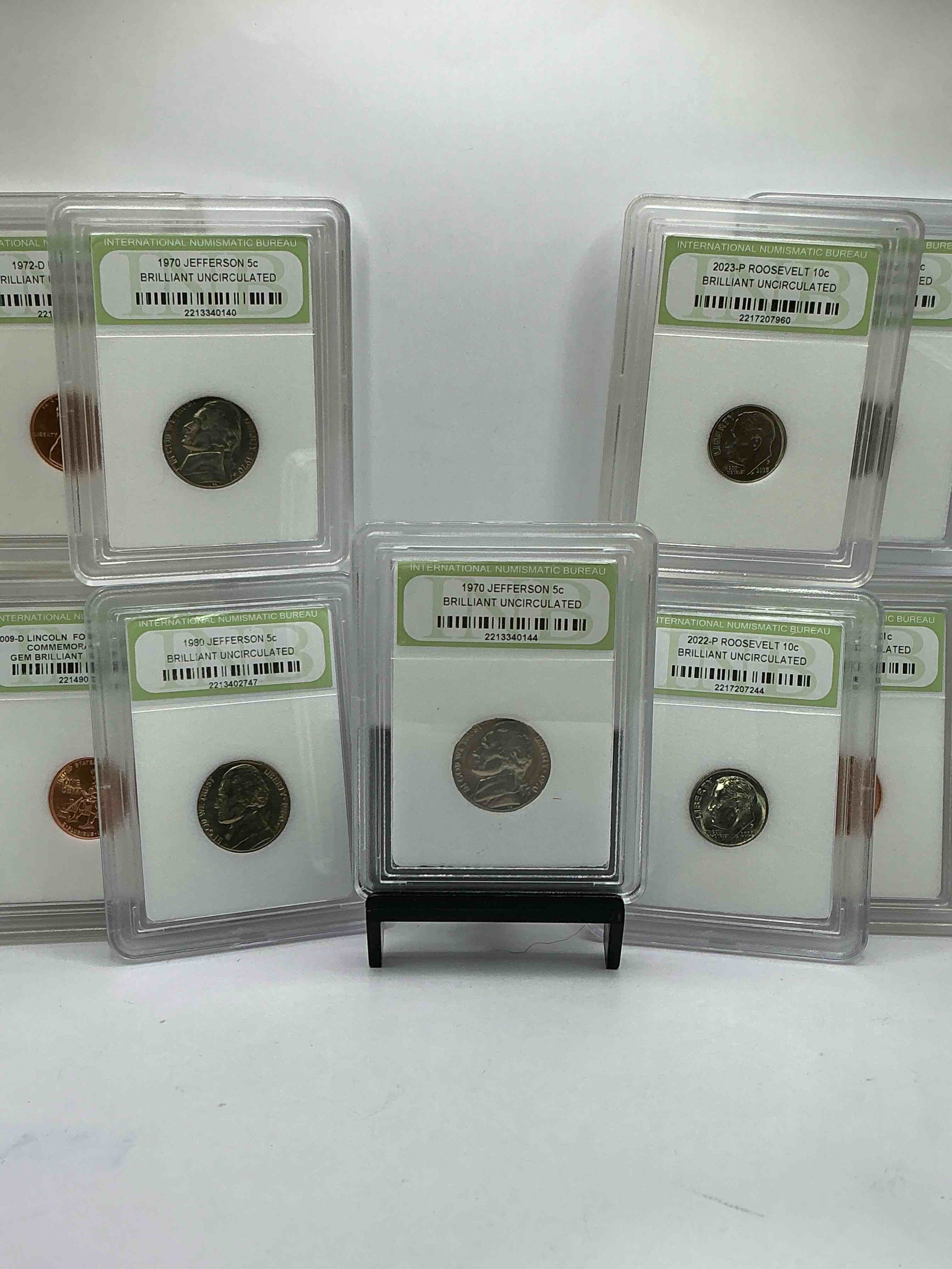 Condition photo showing New/Like New for Collector's Dream! 9 Different Rare, Slabbed U.S. Collector Coins In Certified/Catalogued Protective Slab Cases! A Great Way to Build An Incredible Collection Of Protected, Rare U.S. Coins! Great For The Coin Fan & Collector!