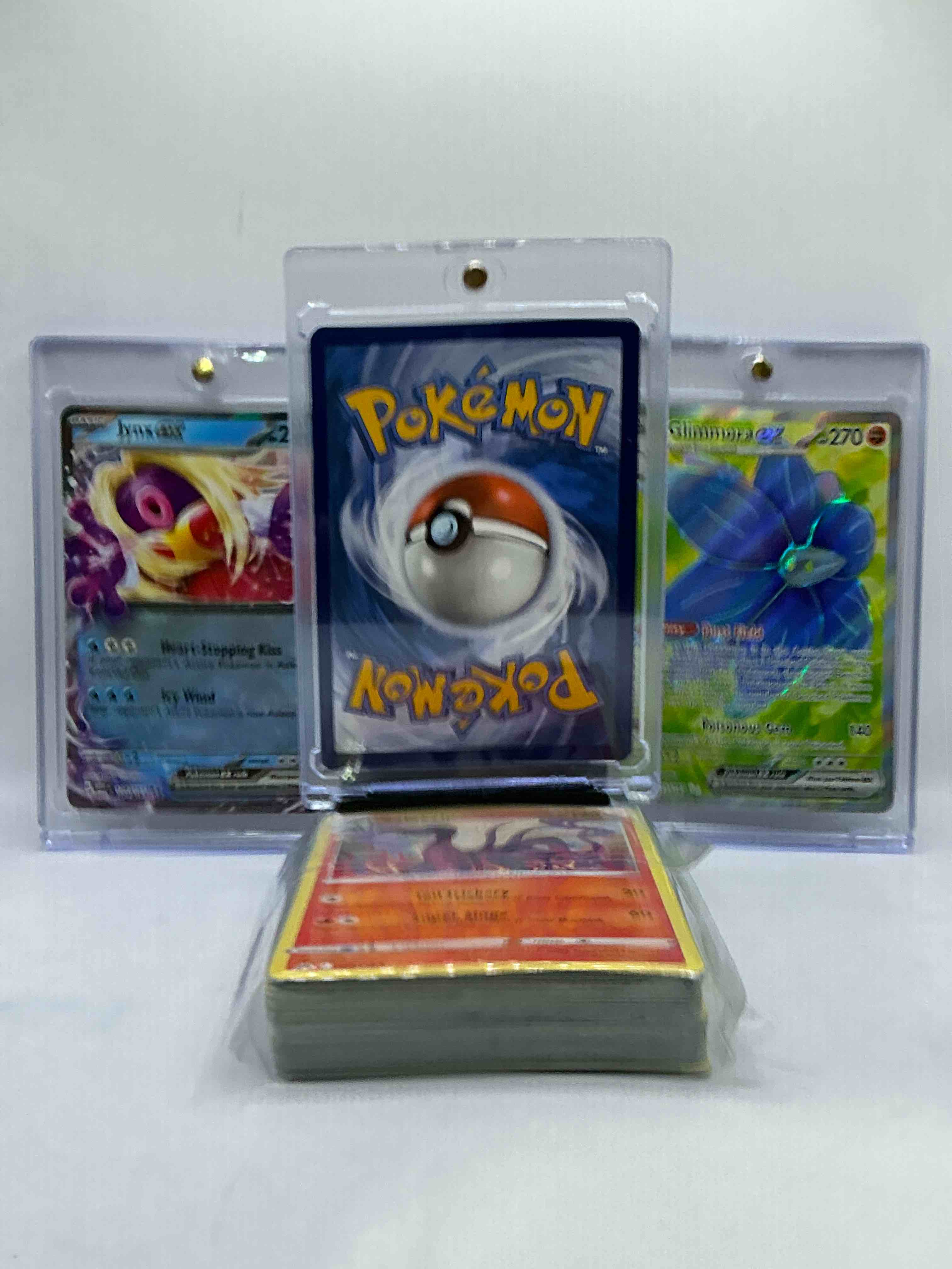 Condition photo showing New/Like New for Pokémon Palooza! Iron Leaves, Jynx EX, Glimmora EX & More! Insane Trio! Pokemon Palooza! This 50 Card Lot Includes Commons, Legends & More!