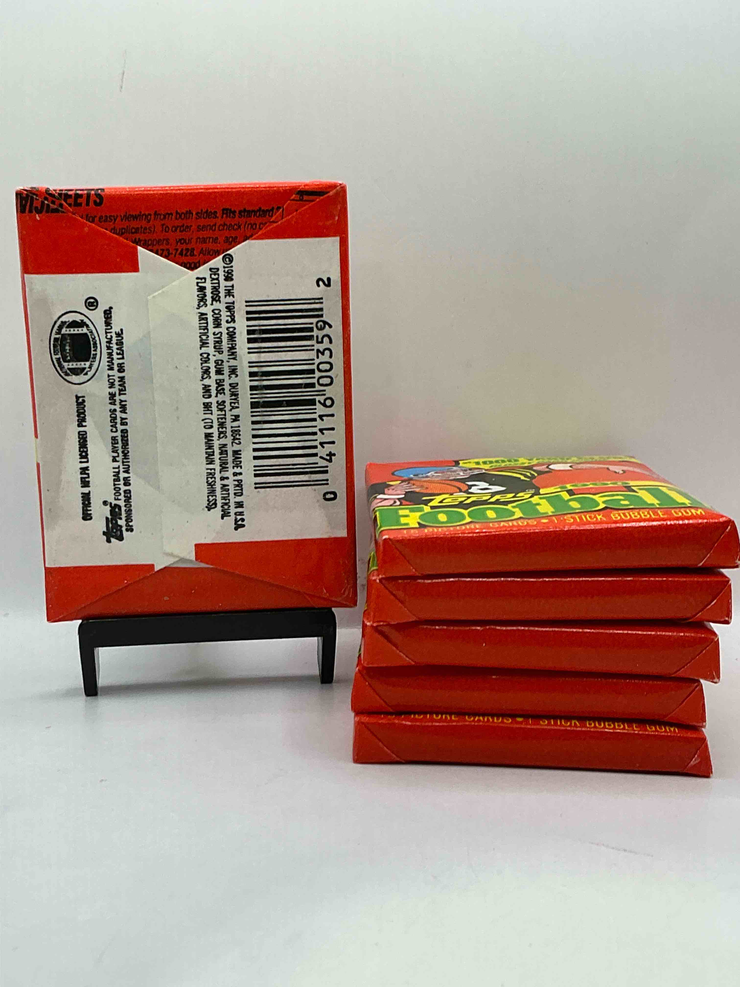 Condition photo showing New/Like New for The Last Year Of Football Wax! Joe Montana, Emmitt Smith & Barry Sanders!? 1990 Topps Football Unopened Sports Card Wax Pack, Direct From Original Retail Box! Getting Hard To Find! Search For Early Barry Sanders & Jerry Rice & So Much More!