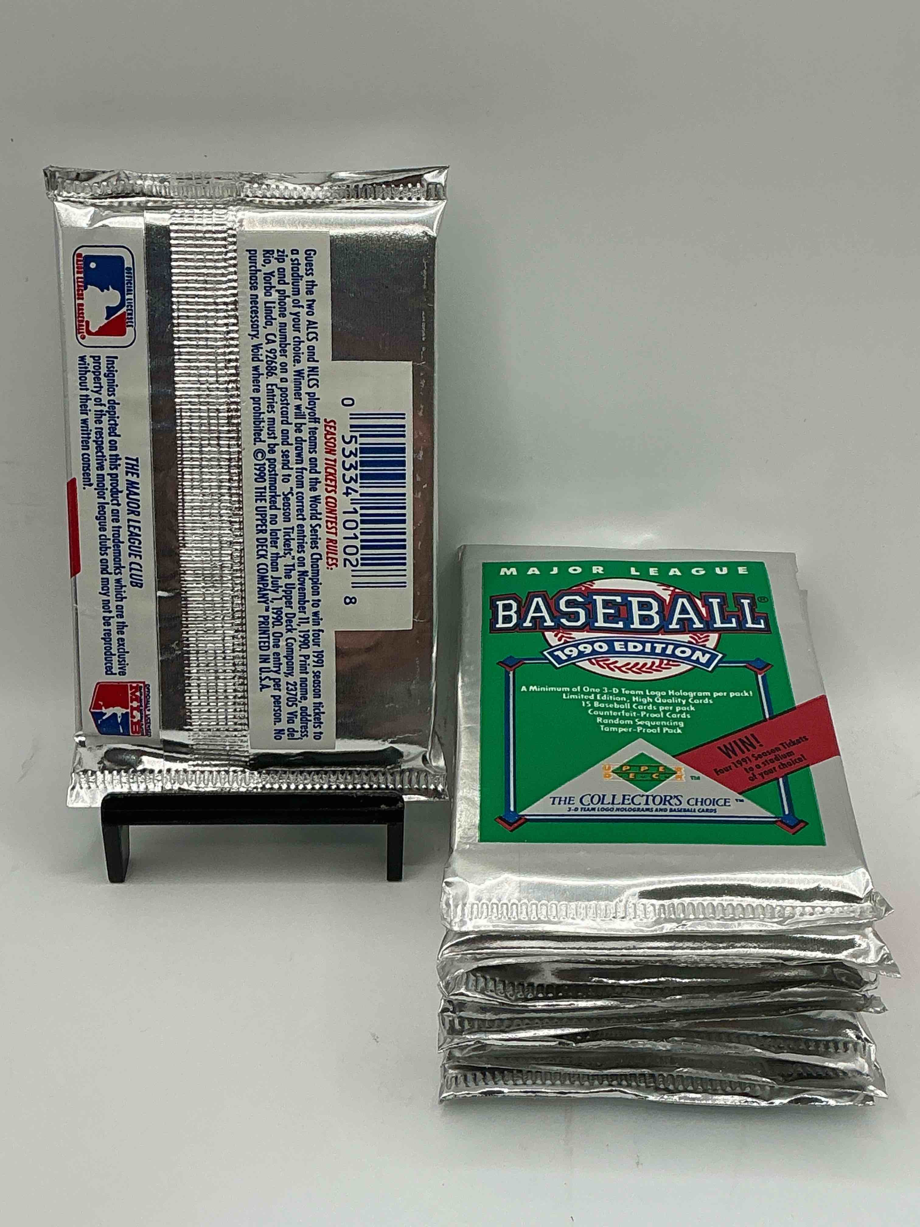 Condition photo showing New/Like New for 1990 Upper Deck Baseball Unopened Sports Trading Card Packs! Direct From Original Box! Look For Possible Collector's 3D Team Logo Card! As Well As Early Ken Griffey Jr. Cards!