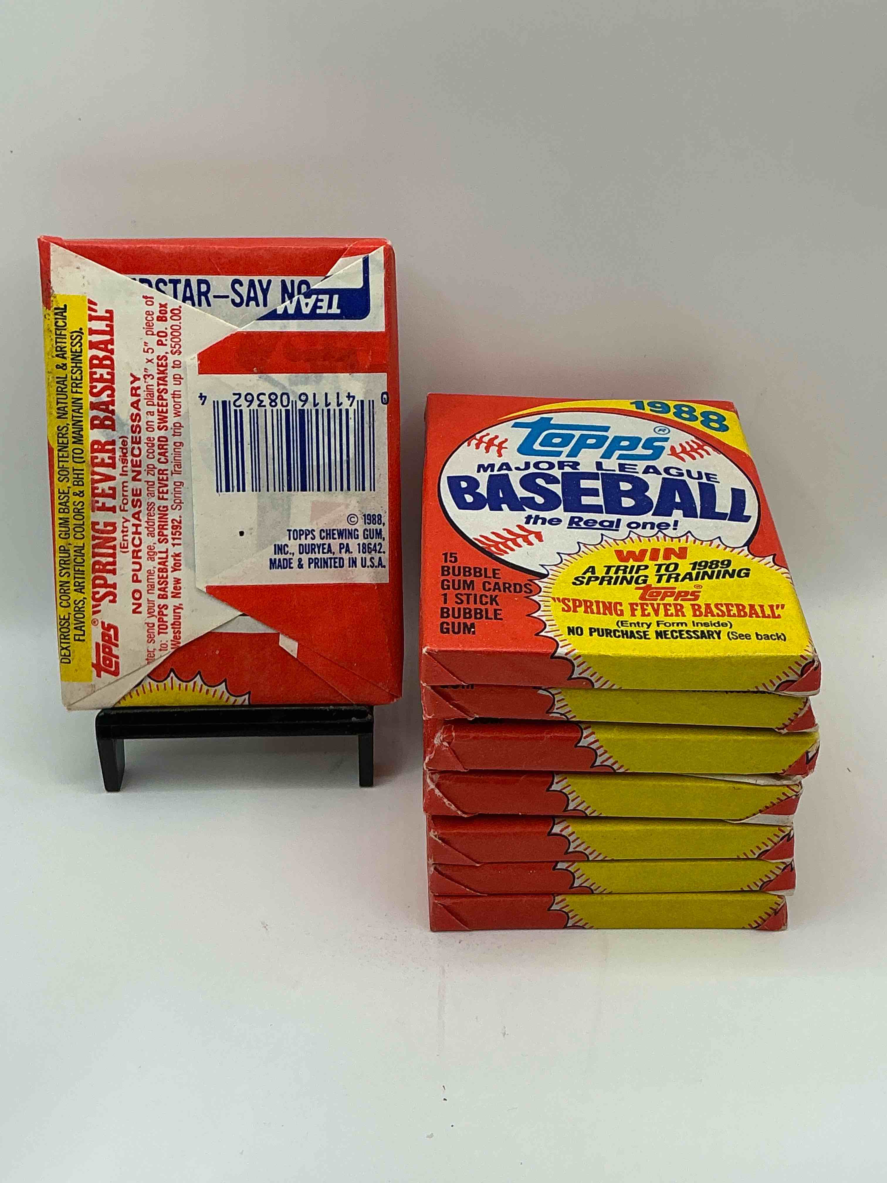 Condition photo showing New/Like New for 80's Baseball Fan's Rejoice! 1988 Topps Baseball Unopened Wax Packs Full Of Collectible Trading Cards! Search For Valuable Don Mattingly "World Of Baseball" & Nolan Ryan Cards Worth Hundreds In Perfect Condition!