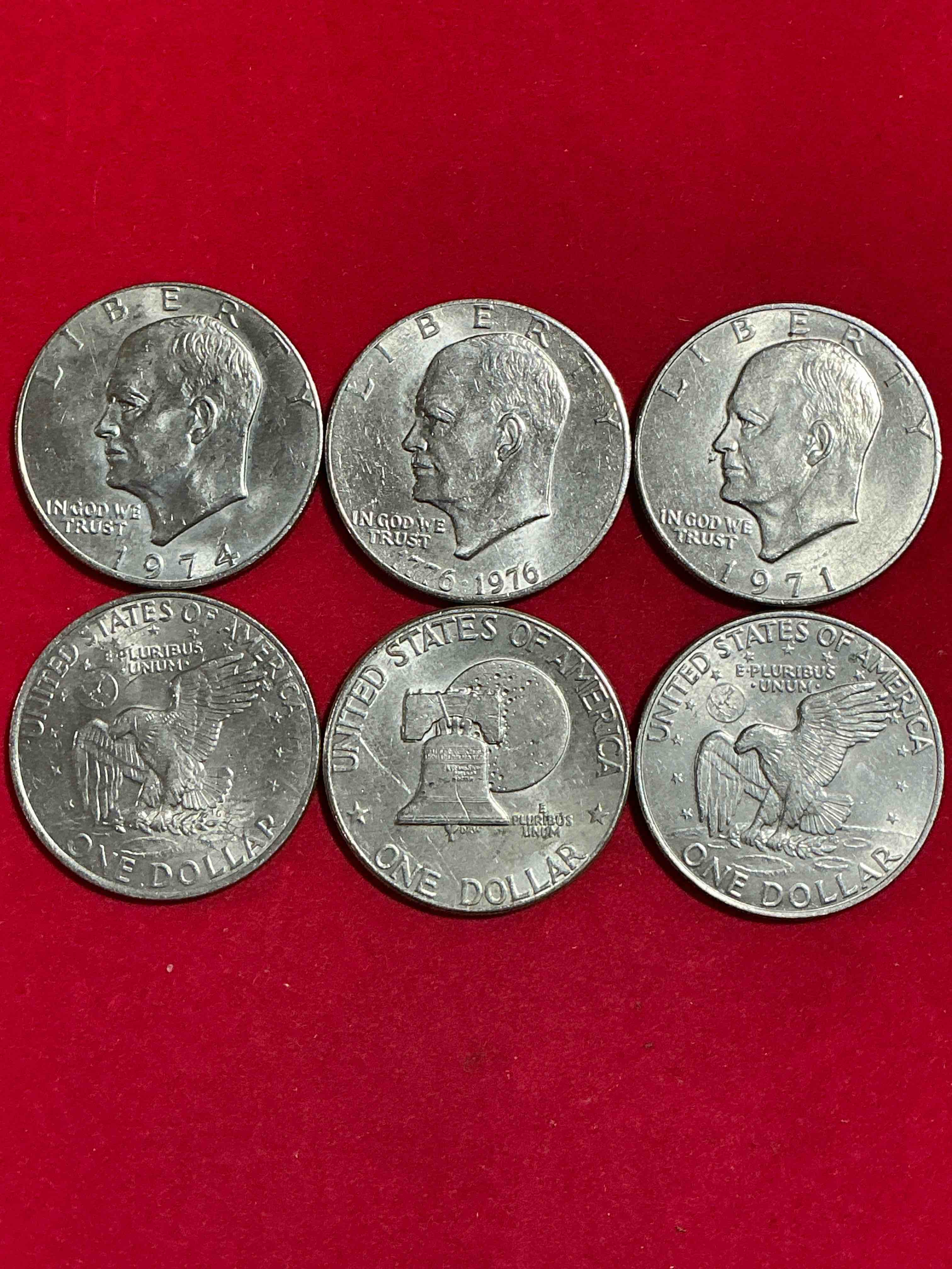 Condition photo showing Good Condition for Eisenhower Dollars! Here’s Six, Circulated “Ike” Dollars! Up For Auction Are Ike One Dollar Coins From Different Years! Awesome Ike Dollars!