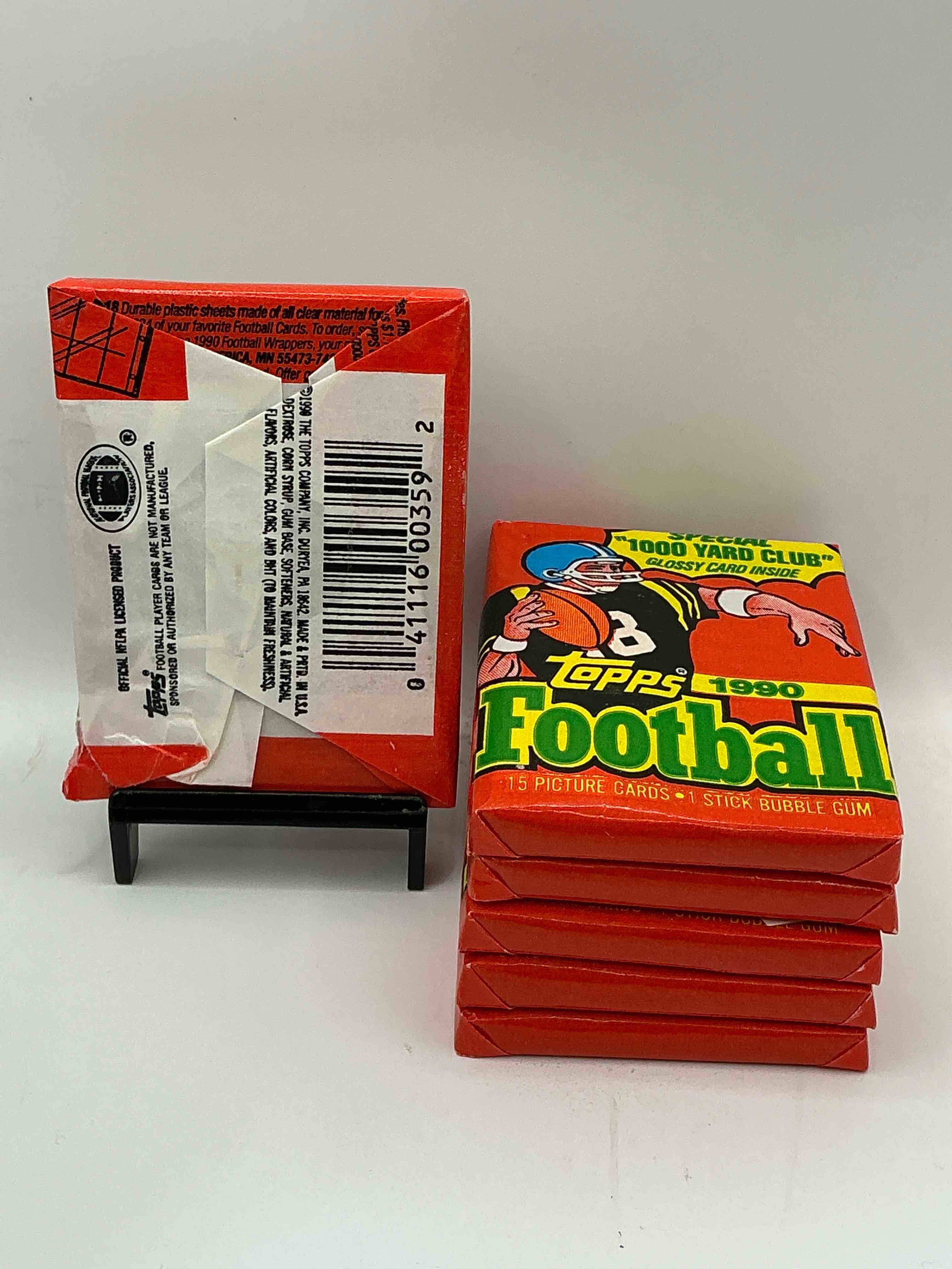 Condition photo showing New/Like New for The Last Year Of Football Wax! Joe Montana, Emmitt Smith & Barry Sanders!? 1990 Topps Football Unopened Sports Card Wax Pack, Direct From Original Retail Box! Getting Hard To Find! Search For Early Barry Sanders & Jerry Rice & So Much More!