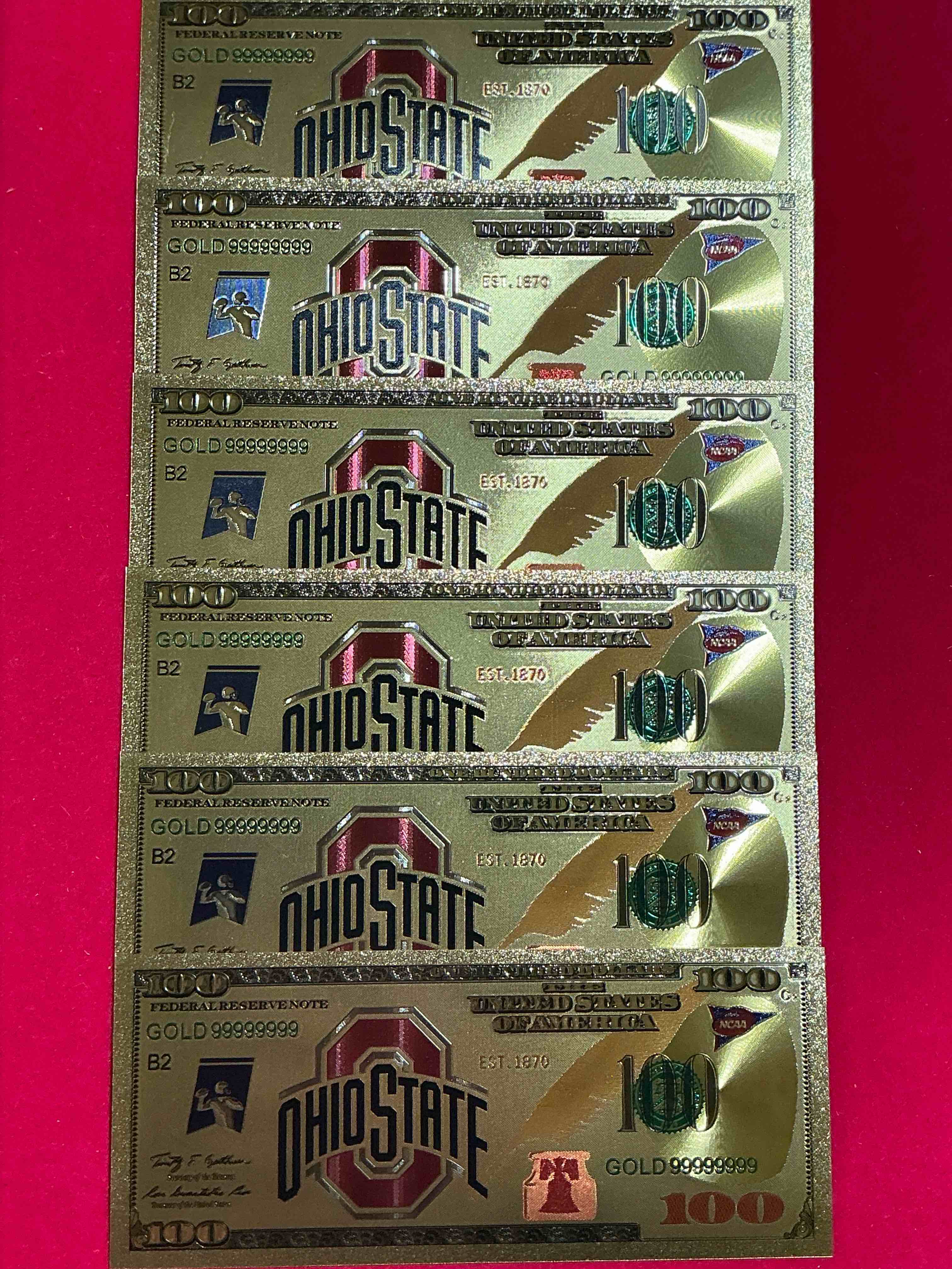 Ohio State University Collectible Memorabilia! Super Cool, Gold In Color 100 Dollar Commemorative Ohio State University Bill! Cool Designs On Front & Back Of Bill! OSU Fans Rejoice, Cool Memorabilia! Plastic Bills With Cool Designs! 