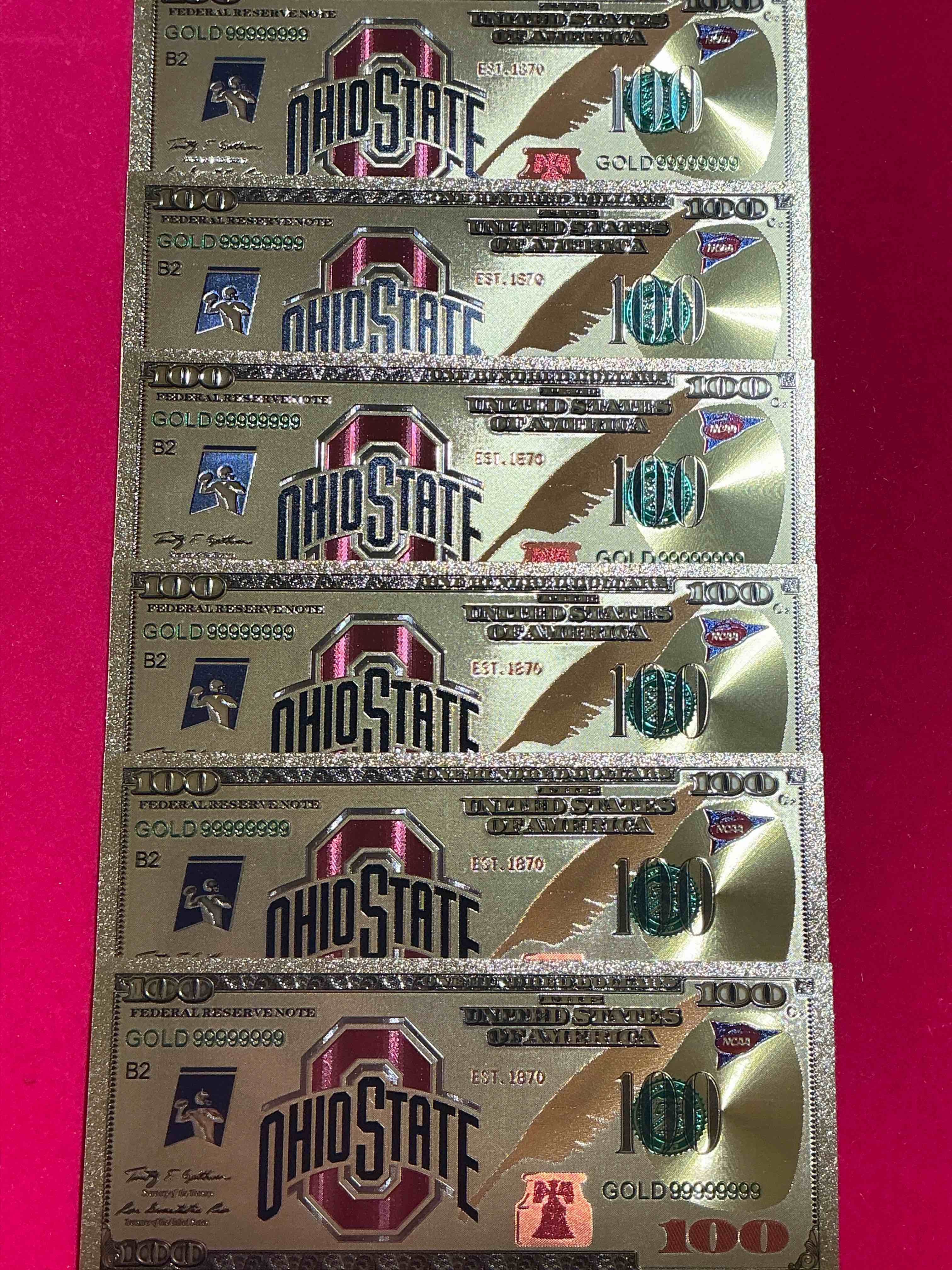 Ohio State University Collectible Memorabilia! Super Cool, Gold In Color 100 Dollar Commemorative Ohio State University Bill! Cool Designs On Front & Back Of Bill! OSU Fans Rejoice, Cool Memorabilia! Plastic Bills With Cool Designs! 