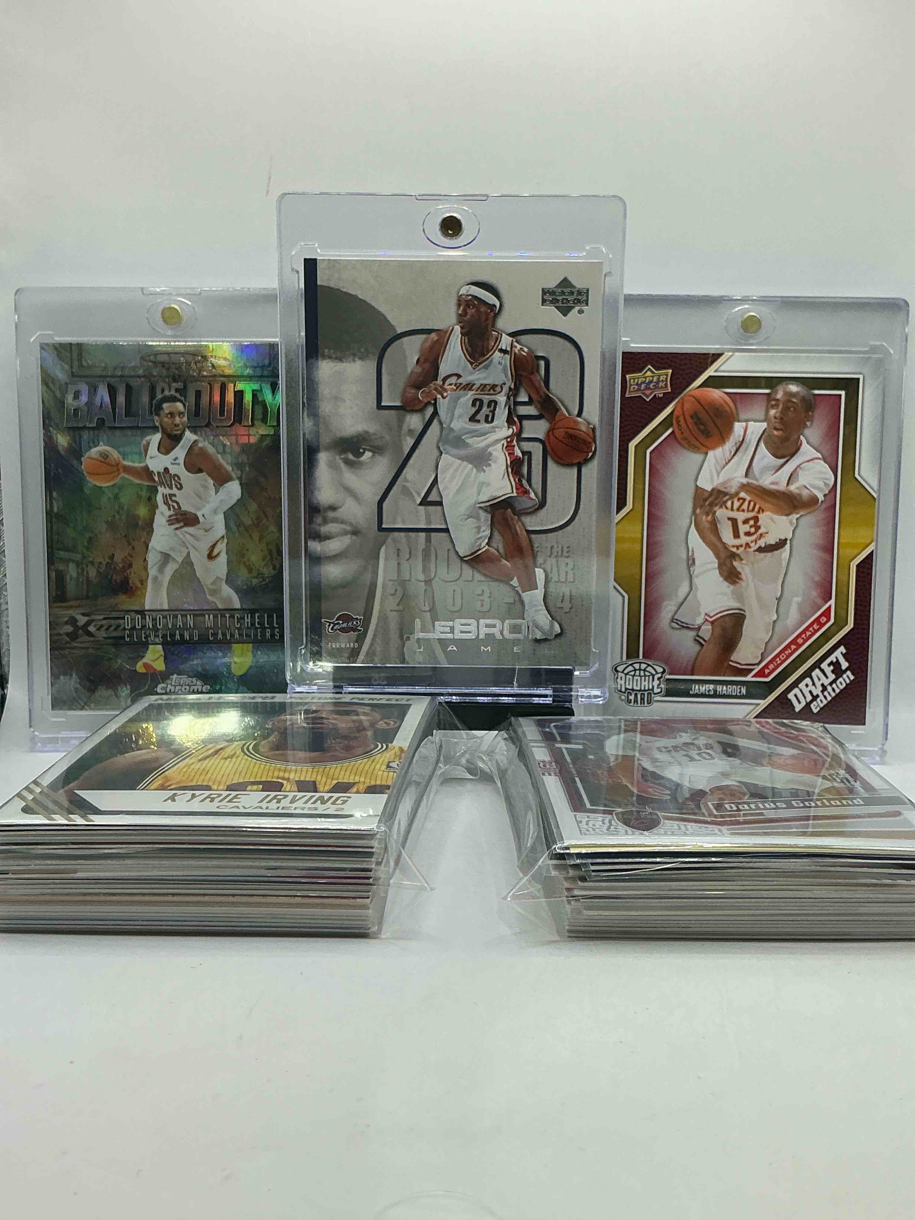 lebron james upper deck rookie of the year card, james harden upper deck rookie & donovan mitchell ball of duty topps chrome card! wow! insane! this 50 card cavs lot includes commons, legends, heroes & more, some insane cards inside! rookies & more! cleveland cavaliers craziness!