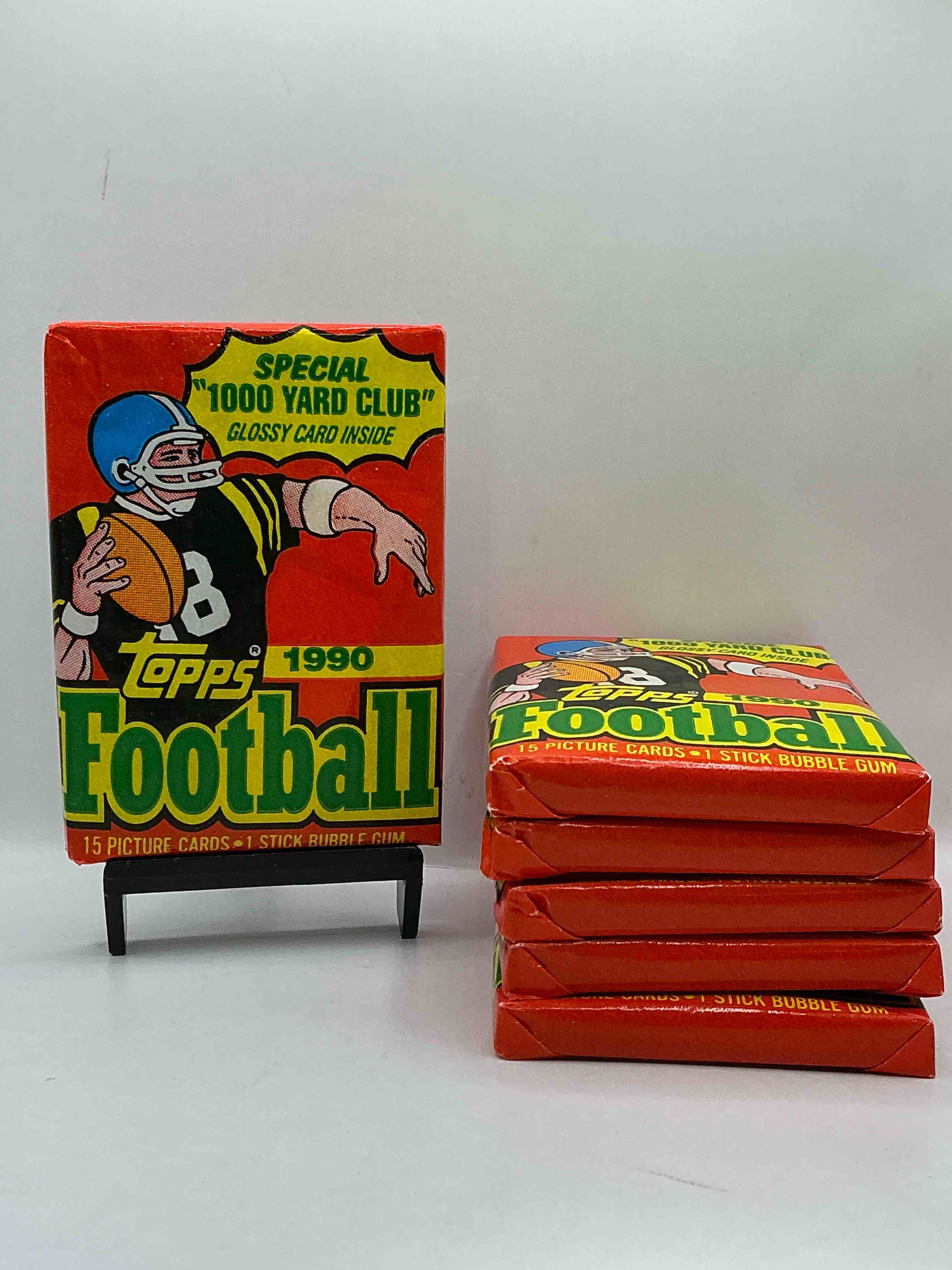 the last year of football wax! joe montana, emmitt smith & barry sanders!? 1990 topps football unopened sports card wax pack, direct from original retail box! getting hard to find! search for early barry sanders & jerry rice & so much more!