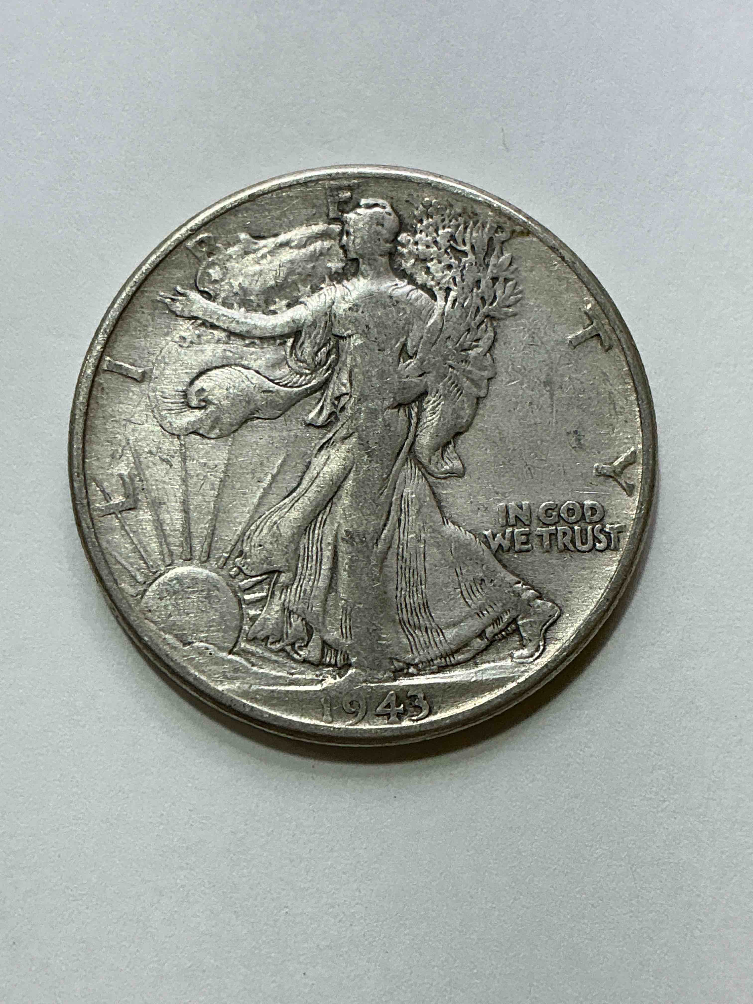 world war ii era silver! antique u.s. silver! liberty walking silver fine u.s. silver half dollar! this striking half dollars were minted from 1916-1947 & have become some of the most collectible coins in history! here is a striking appears uncirculated example from 1943! liberty walking coins are 90% fine u.s. silver, a great investment in precious metal!