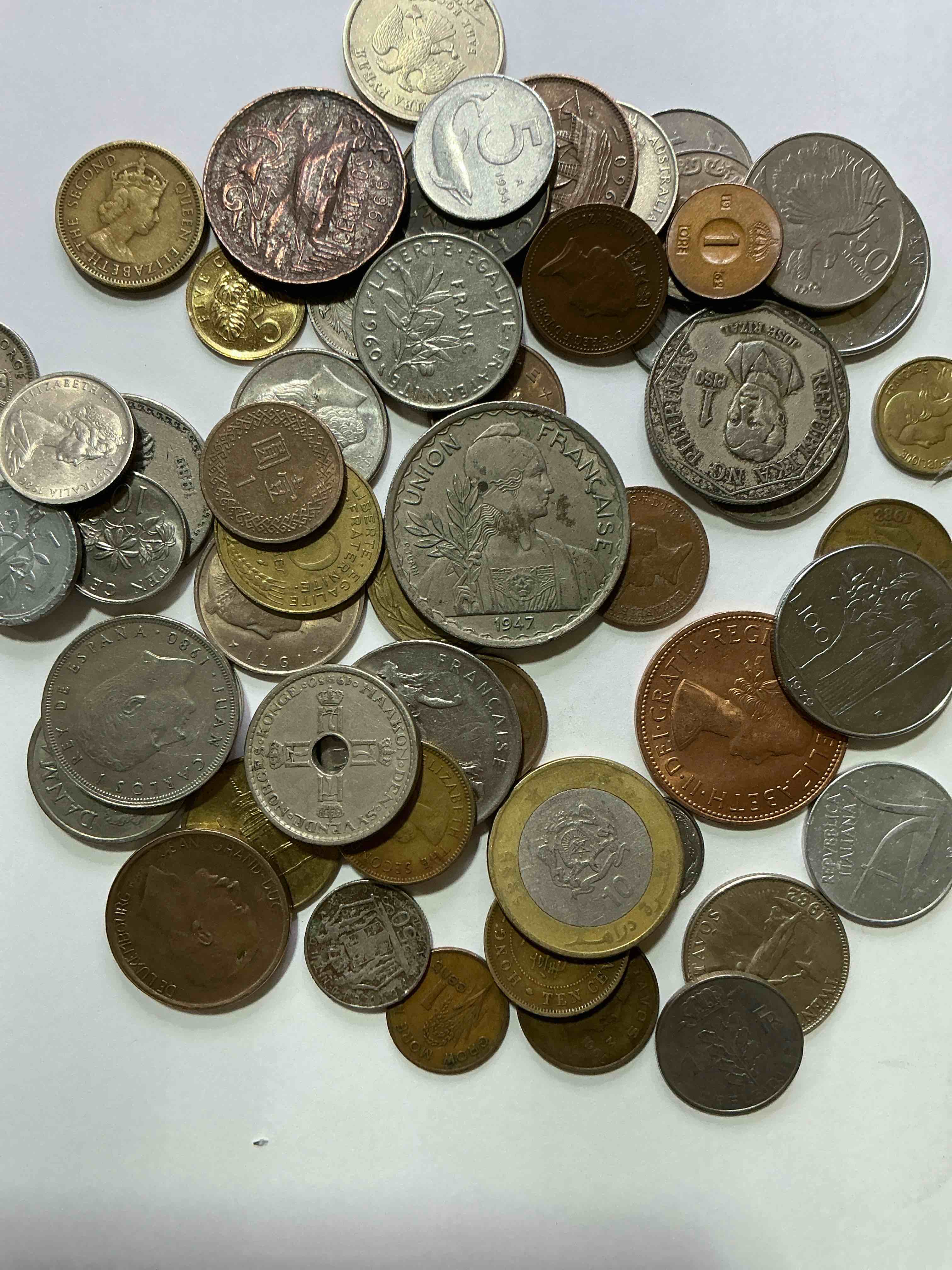 Condition photo showing Good Condition for world coins, antique & vintage! each lot is unique! many different years, countries, sizes & exotic places. this cool collection of antique coins from around the world is loads of fun! have fun identifying each coin & country as a great educational tool! a great investment too!