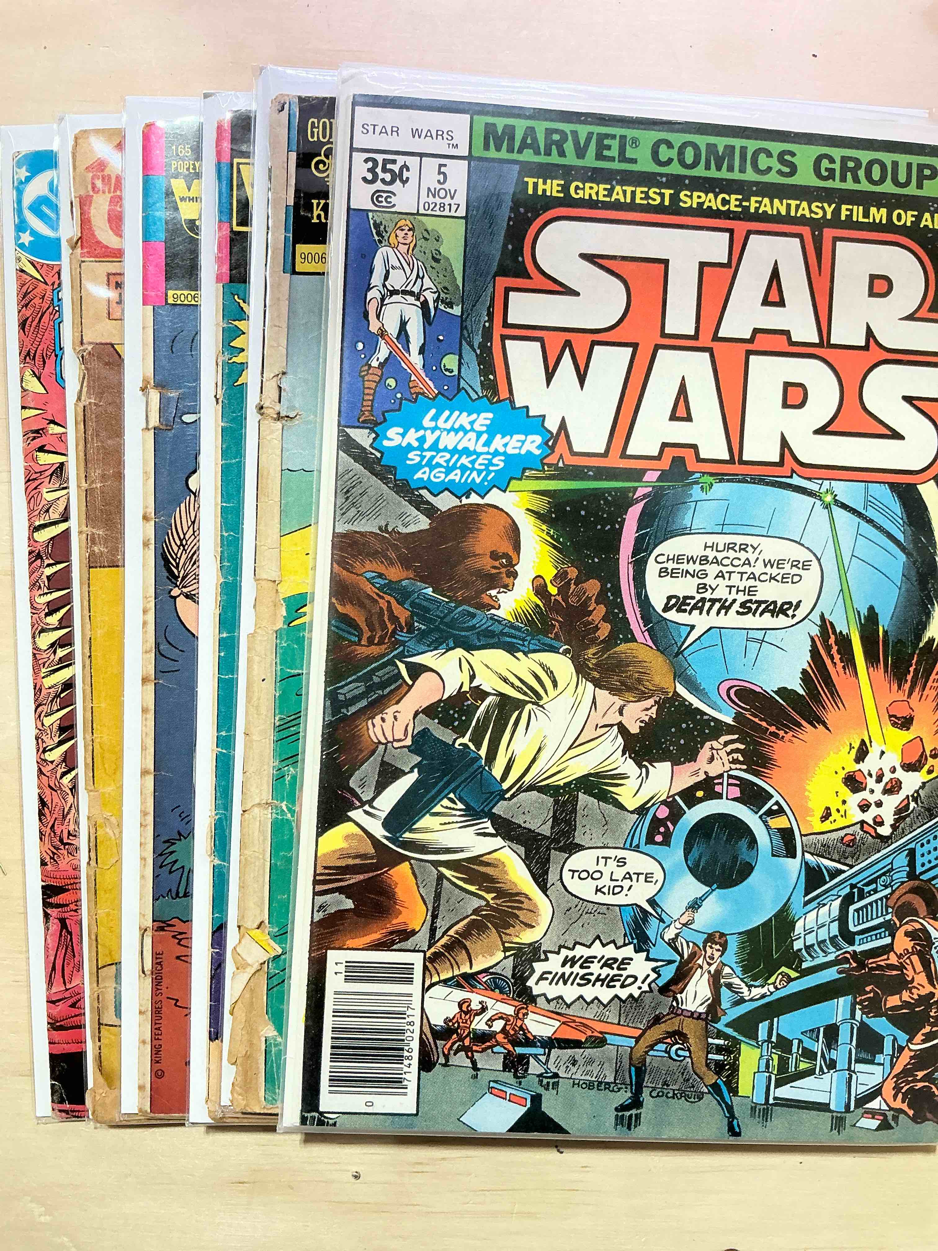 Comic Book Craziness!  Includes Original Star Wars Comic WOW!  Great Collection Of Comic Books Spanning Many Decades,  All Encased With Protective Sleeves & Backing.  Generally In Good / Fine Condition For Age.  A Great Way To get An Eclectic Comic Collection Spanning Generations!