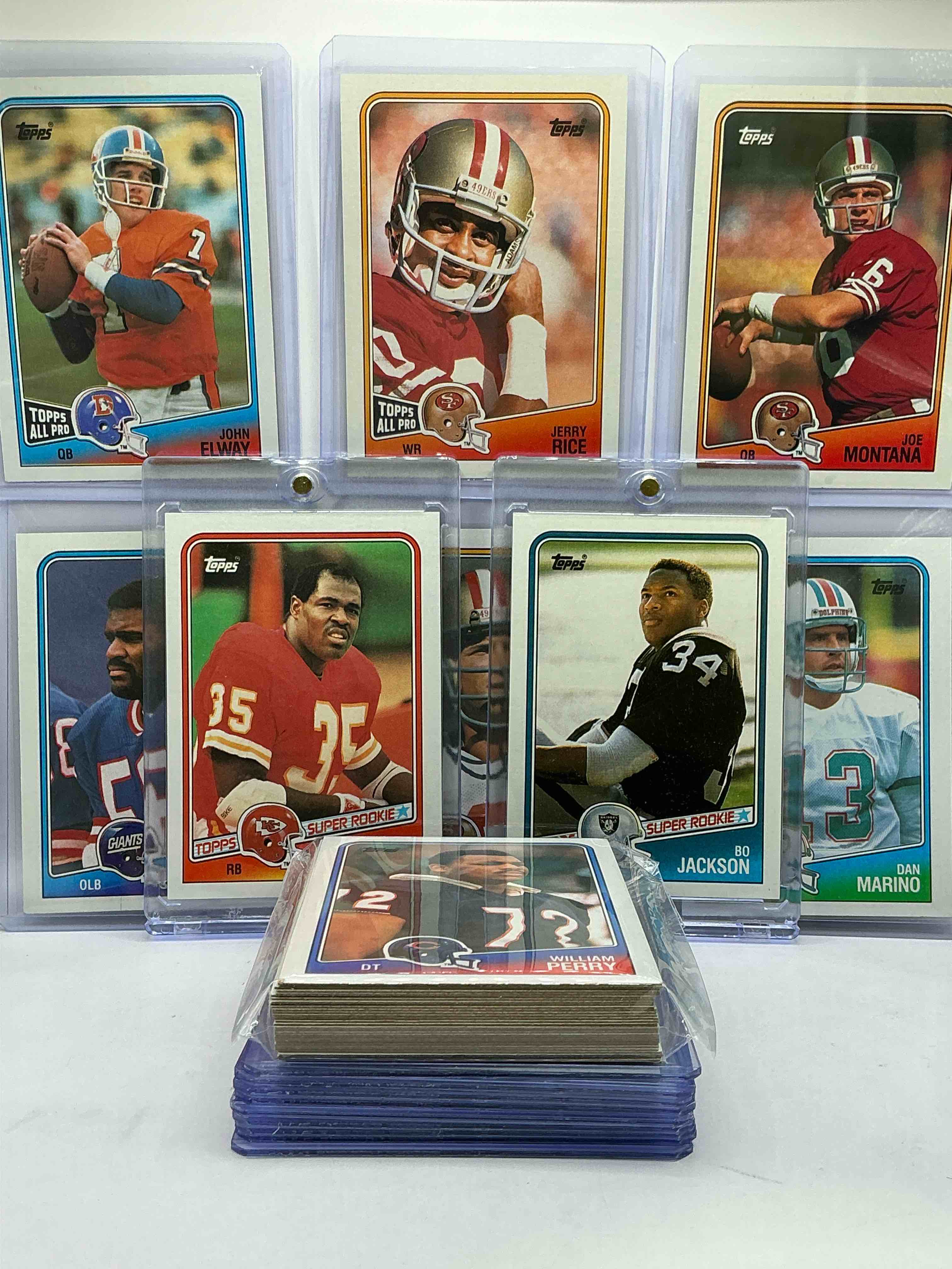bo jackson rookie! 1988 topps football 50 card lot! the biggest names from the era! jerry rice, joe montana, dan marino, john elway, lawrence taylor & more! perfect for any 80’s baseball fan… with insane bo jackson rookie card! wow!