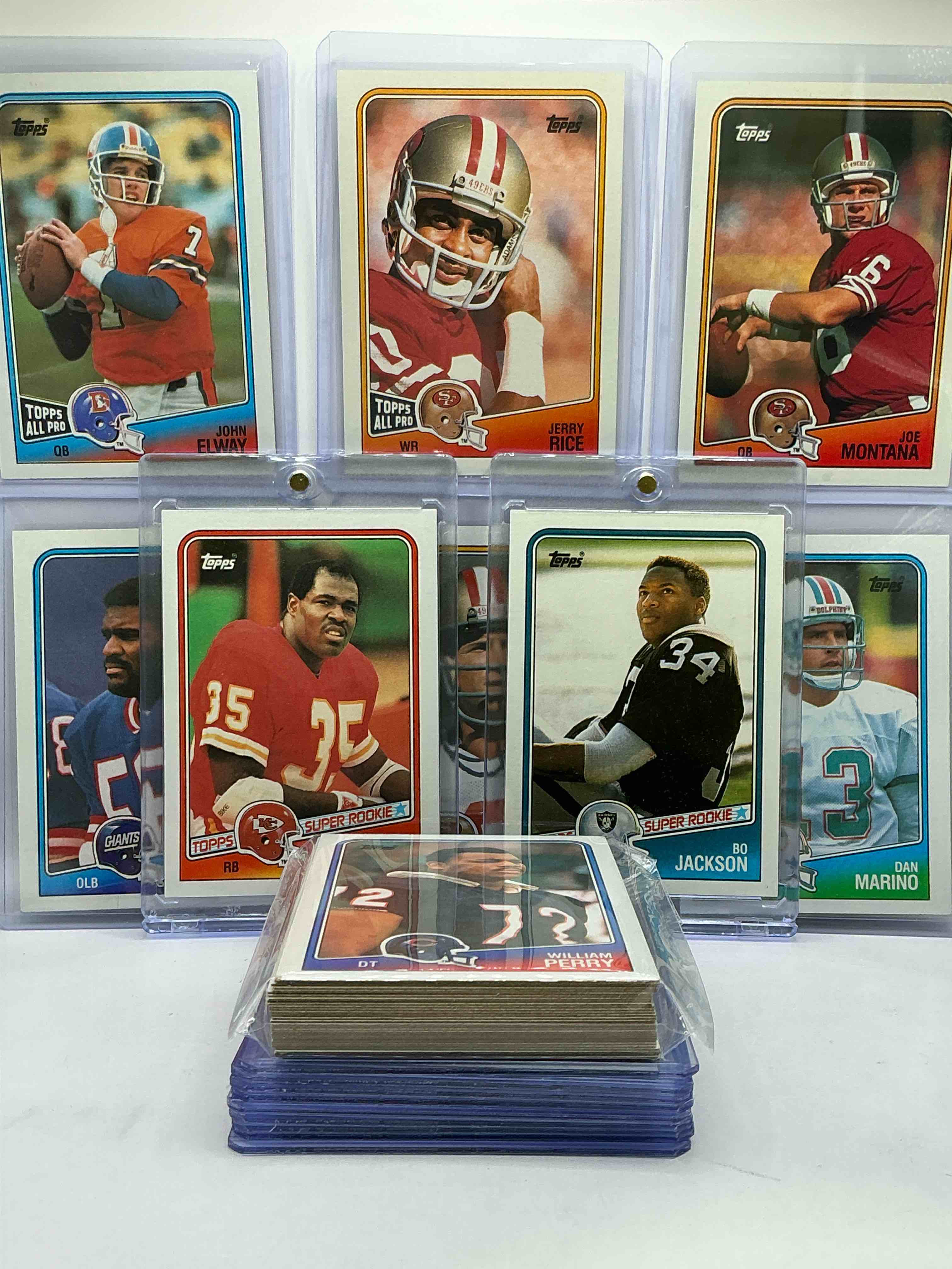 Condition photo showing New/Like New for bo jackson rookie! 1988 topps football 50 card lot! the biggest names from the era! jerry rice, joe montana, dan marino, john elway, lawrence taylor & more! perfect for any 80’s baseball fan… with insane bo jackson rookie card! wow!