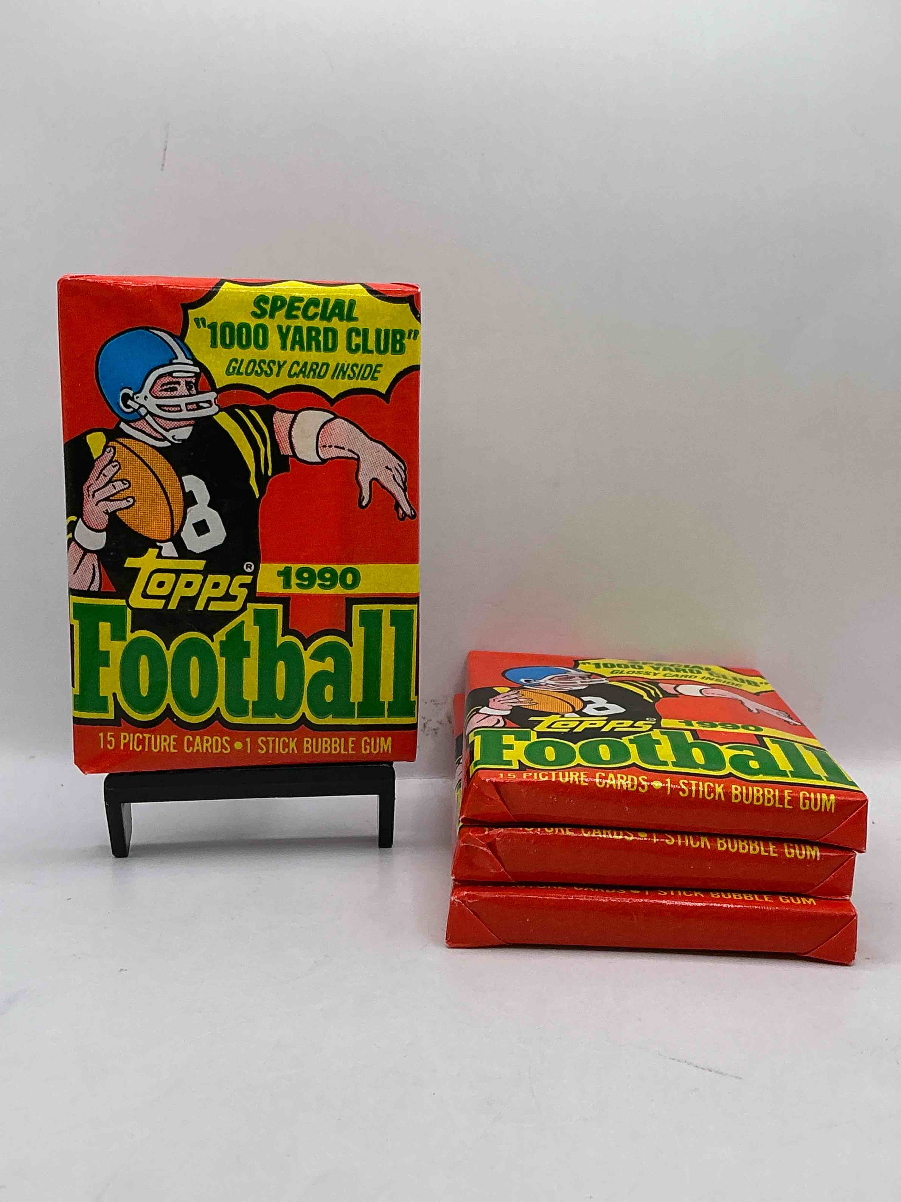 the last year of football wax! joe montana, emmitt smith & barry sanders!? 1990 topps football unopened sports card wax pack, direct from original retail box! getting hard to find! search for early barry sanders & jerry rice & so much more!