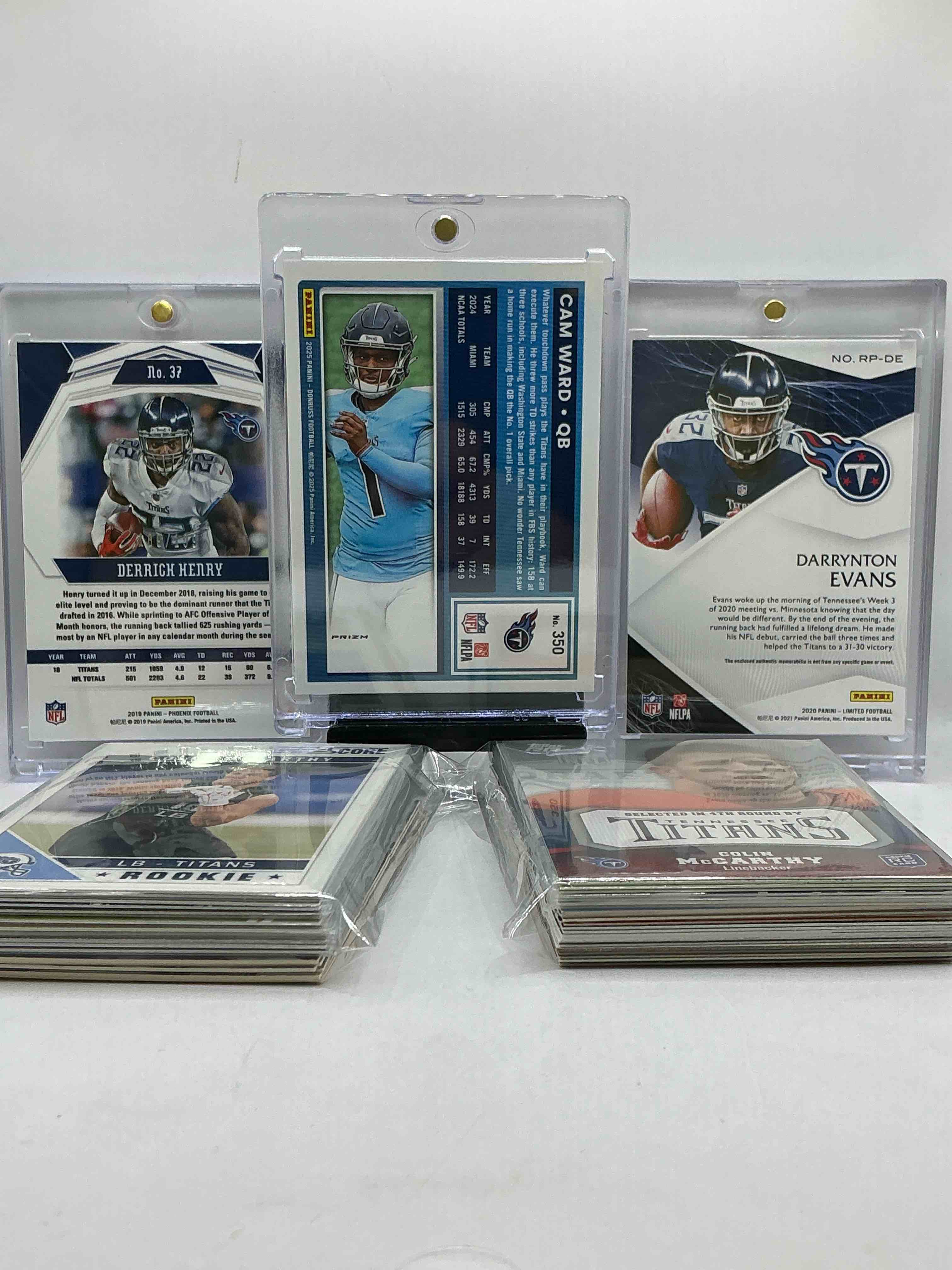 Condition photo showing New/Like New for cam ward pink optic & derrick henry pink phoenix! /199! wow! titans insanity! rookies, jersey & numbered cards, legends, heroes, vintage & new & more! wow! nashville football craziness! titans 50 card lot, commons & legends!