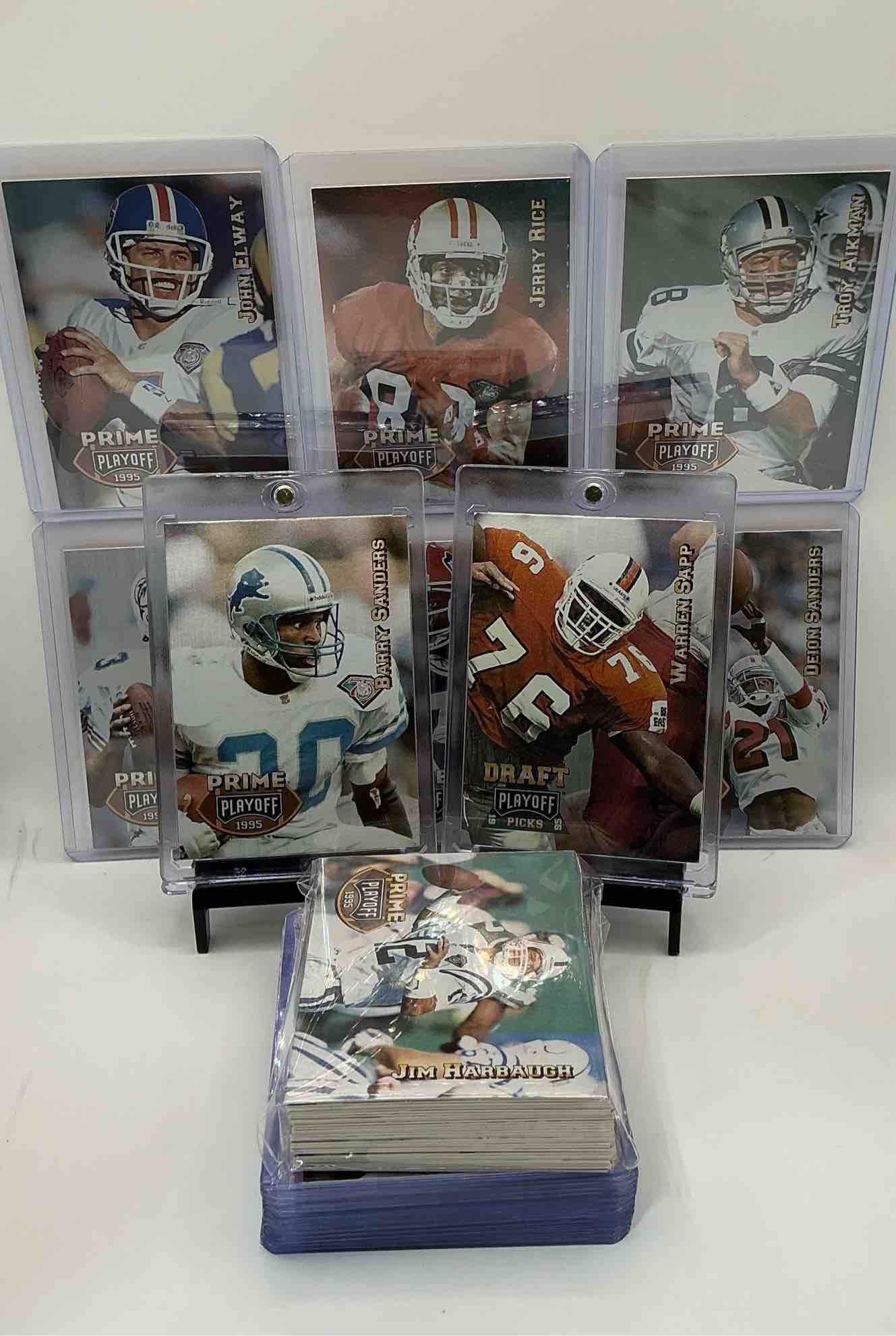 1995 playoff football card craziness! warren sapp rookie! along with all the best players from the 90’s! barry sanders, john elway, dan marino, bruce smith & so many more all included in the 50 card lot!