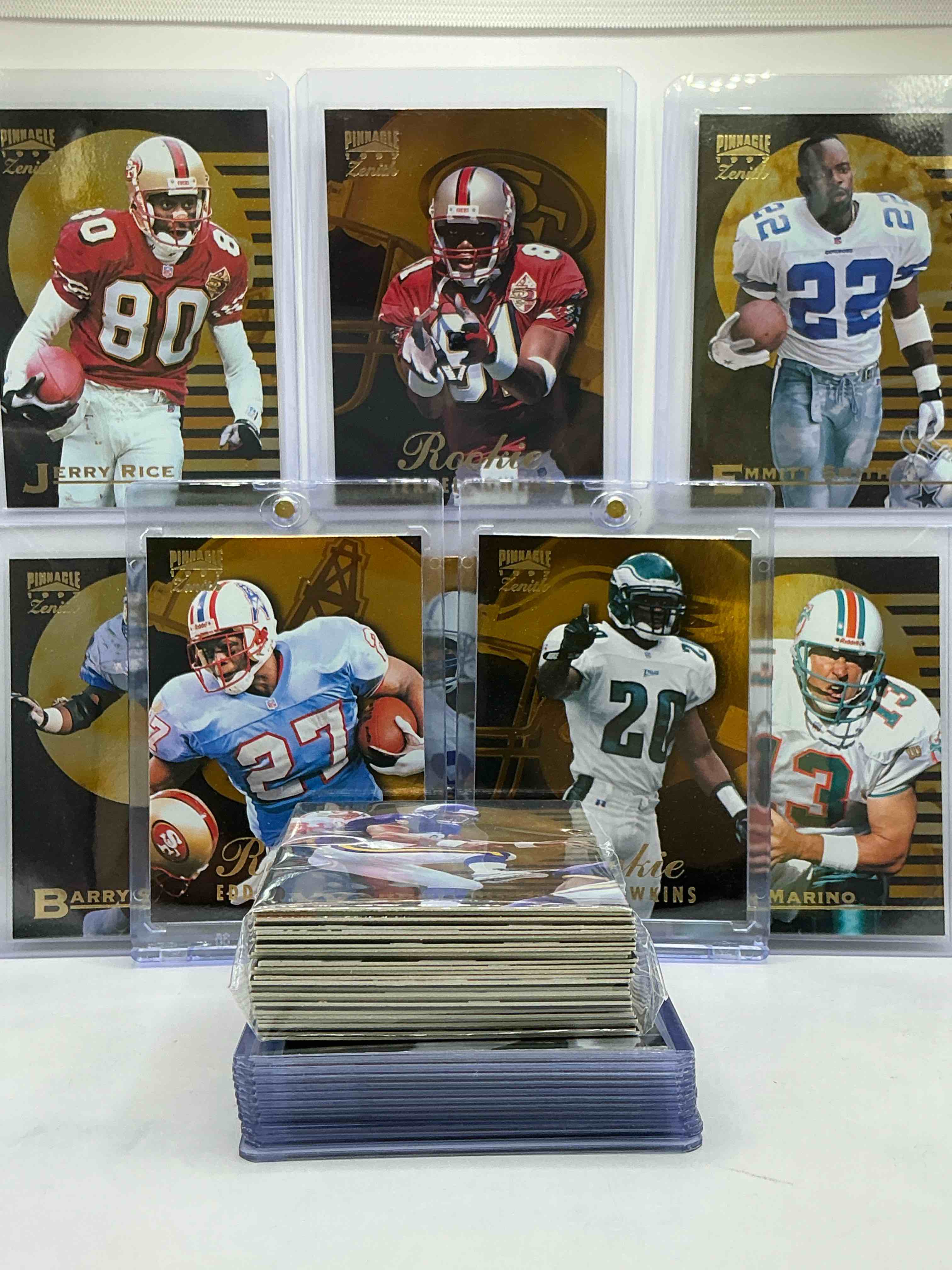 1997 pinnacle football cards! eddie george, brian dawkins, terrell owens & marvin harrison rookies! jerry rice, dan marino, emmitt smith & more! awesome, high quality cards! this 50 card lot includes commons, legends, rookies & more!