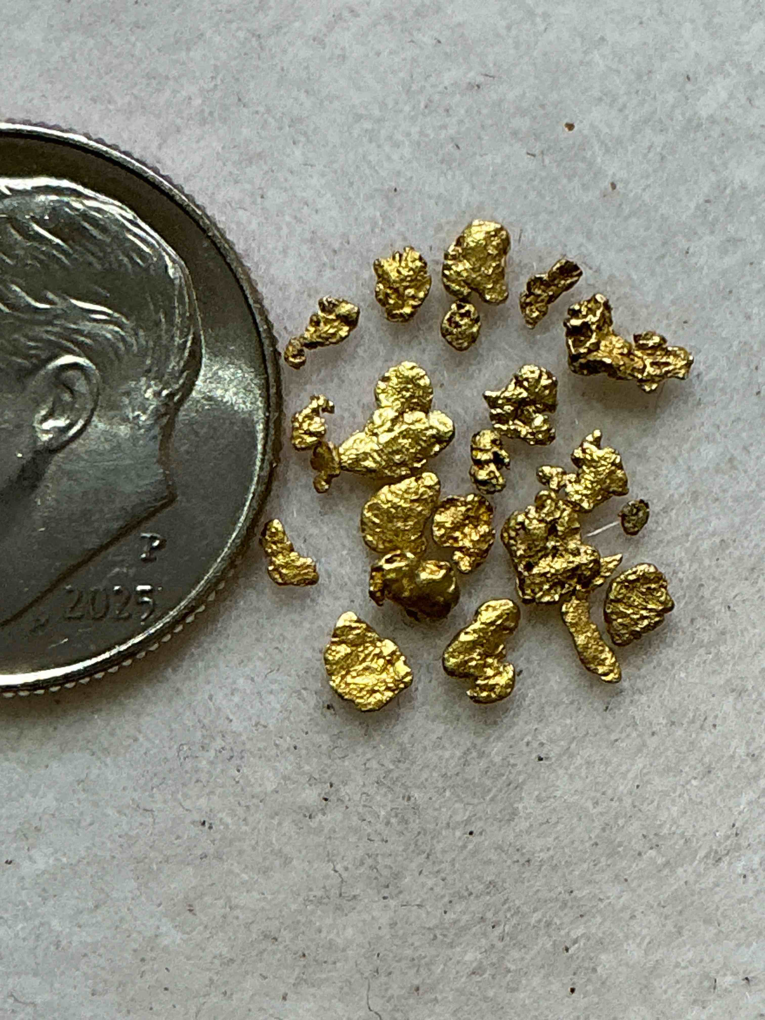 Condition photo showing Good Condition for genuine gold nuggets! gold nuggets fresh from prospecting north carolina mountains, total weight of all nuggets is approximately .5 grams. these gold nuggets typically test at between approx 22-24 karat. gold in raw, prospected form is extremely hard to find & much rarer than any refined form. get in on the gold craze... gold has increased in value over 40% since 2025! u.s. dime for size reference only (not included). gold vile in image included. own genuine, gold nuggets! 