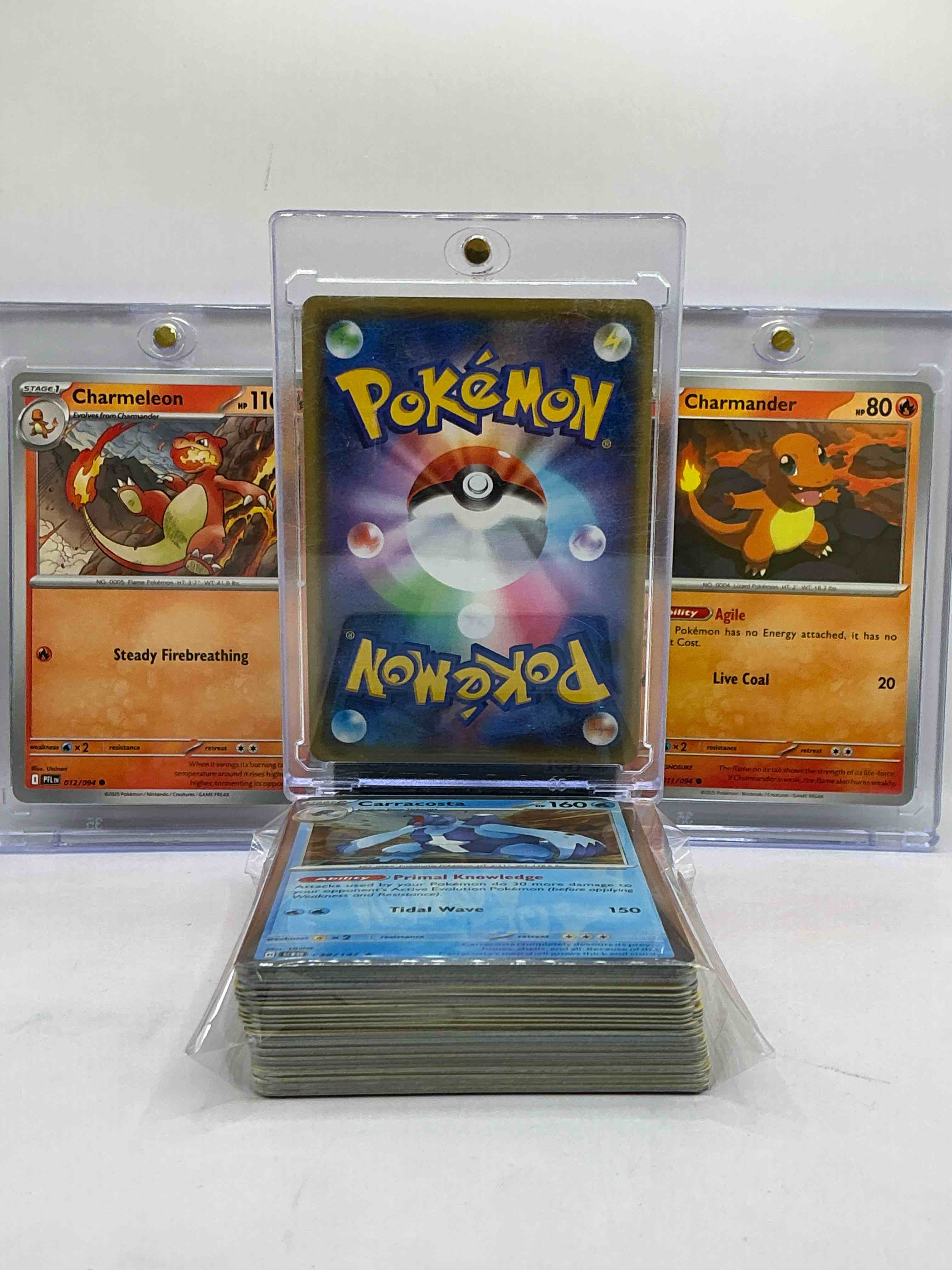 Condition photo showing New/Like New for charmander, charmeleon & charizard! the life of charizard evolution! pokémon wow! these three life stage cards, along with 50 other pokémon heroes, holos, legends & commons- including 1 stage two rare holographic, 2 stage one rare holographic, 3 basic rare holographic, 4 common/ uncommon holographics (all stages), 2 stage two non holographic & 2 rares! also includes 36 non holo common/ uncommon basic & first stage cards trainers & energy too! perfect set for collectors & enthusiasts!