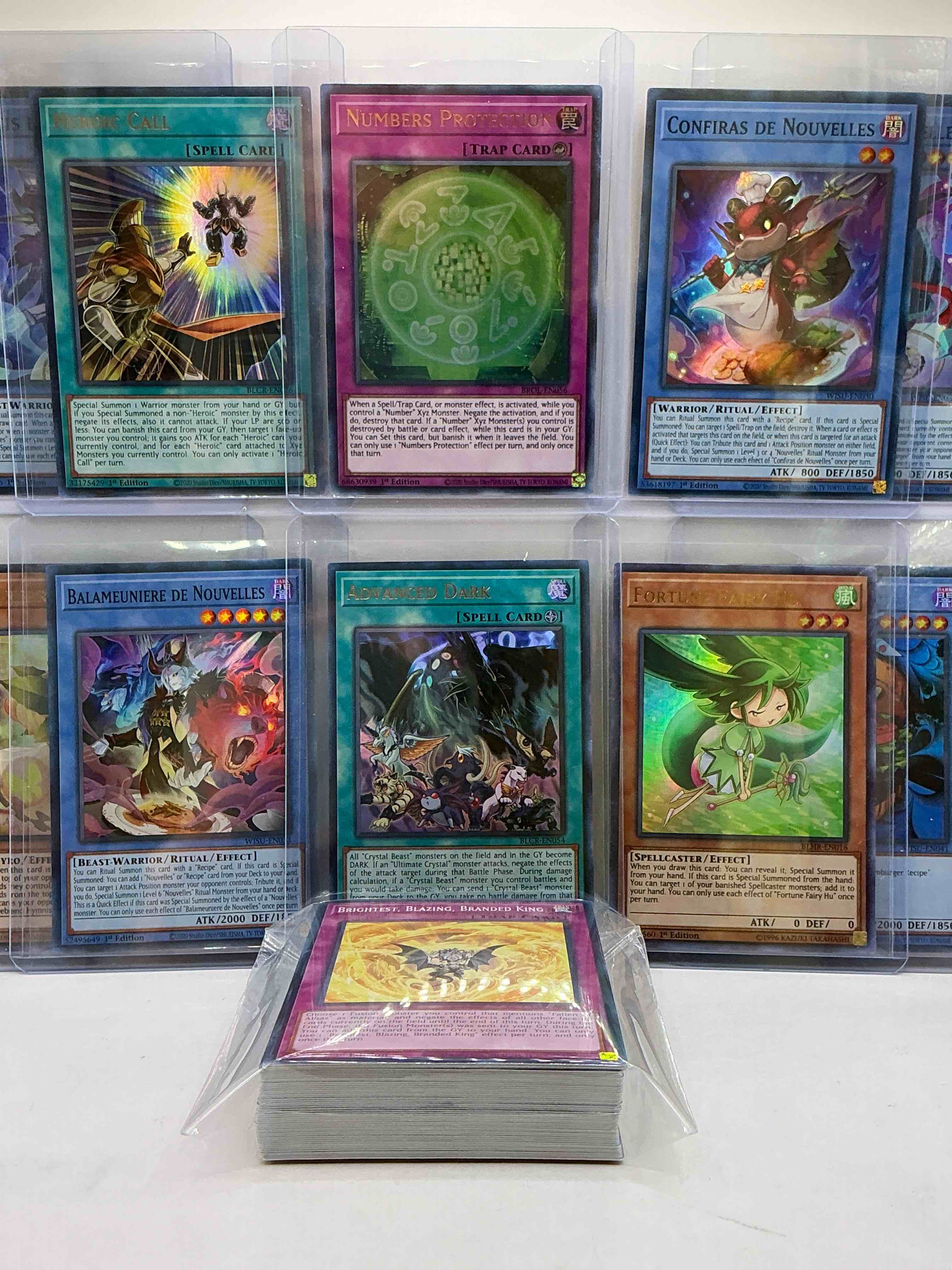 Condition photo showing New/Like New for yu-gi-oh 50 card lot! join the craze of yu-gi-oh with these awesome cards! this 50 card lot includes the big three yu-gi-oh category cards, monsters, spells & traps! this 50 card lot includes some of all three! wow! perfect time to start collecting!