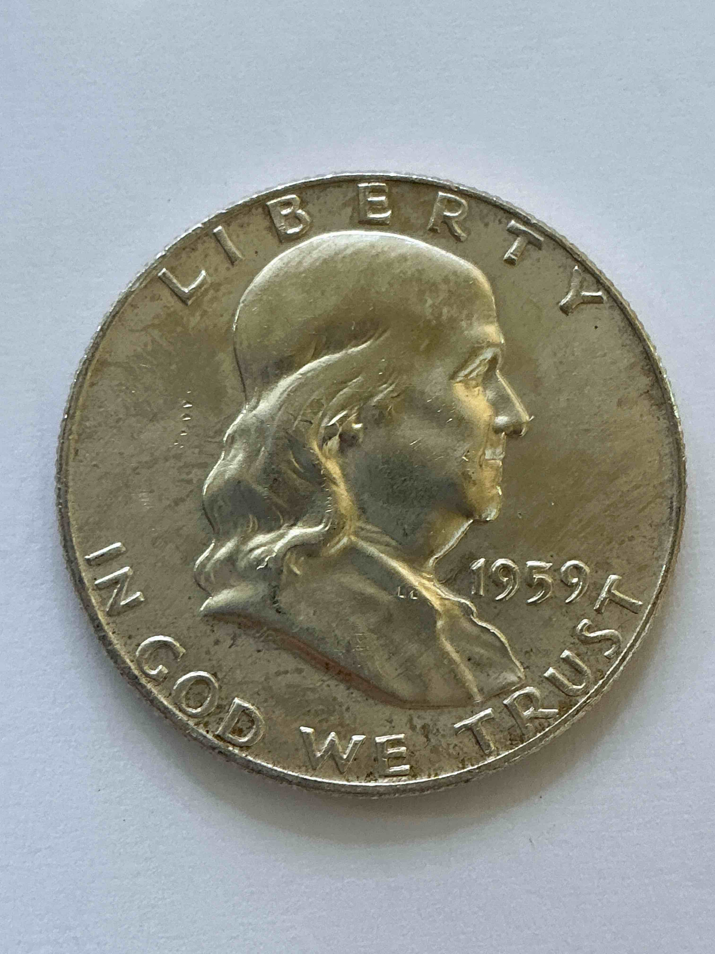 uncirculated ben franklin silver! pre 1965 silver u.s. half dollar coins! before 1965 american half dollars were actually silver, here is a rare 1959 version in excellent, uncirculated condition! great for investing in precious metals! these heavy half dollars were minted at 90% silver and 10% copper, giving them a net weight of .36 ounces of pure silver per coin! very rare in this great. condition!