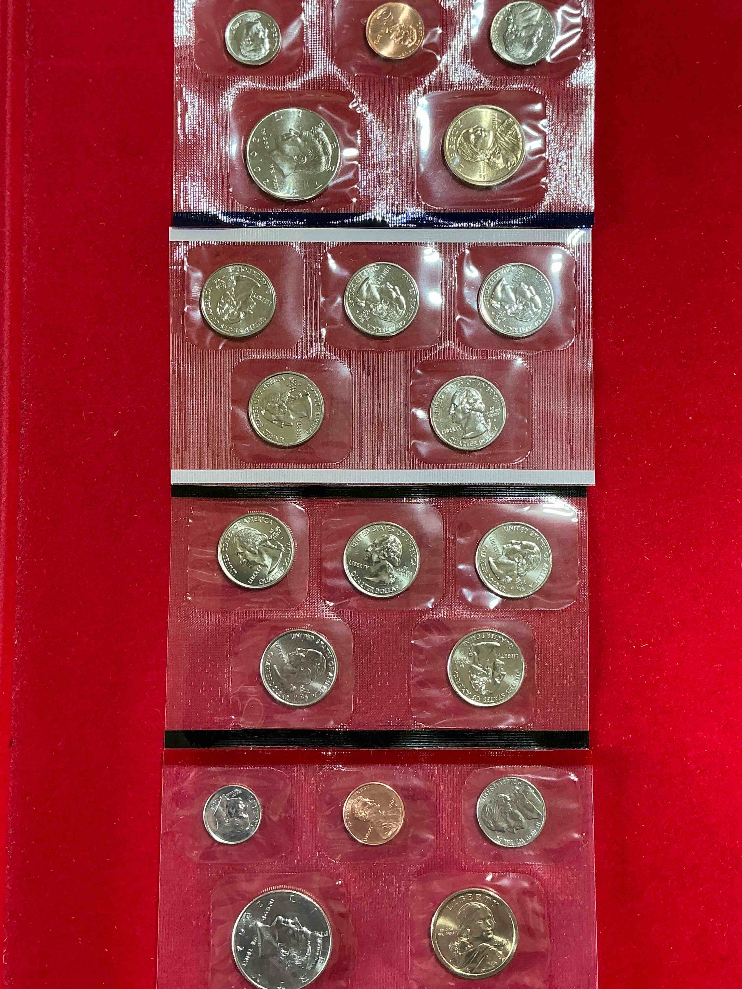 2002 uncirculated mint set! 20 coin mint set with ohio & indiana state quarters! half dollars, one dollar coins, quarters, nickels, dimes & pennies! 20 coin uncirculated mint set! 