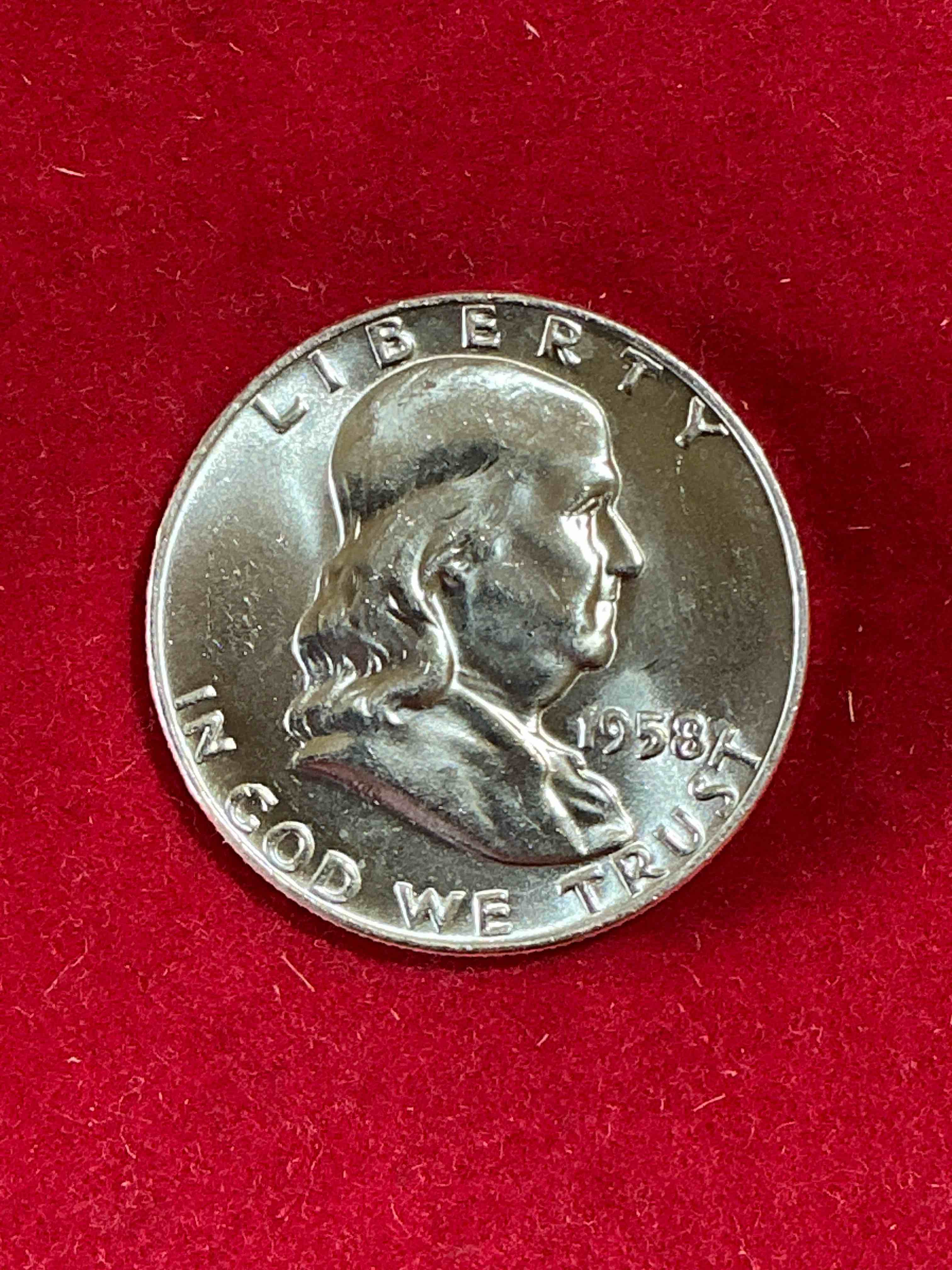 uncirculated ben franklin silver! pre 1965 silver u.s. half dollar coins! before 1965 american half dollars were actually silver, here is a rare 1958 version in excellent, uncirculated condition! great for investing in precious metals! these heavy half dollars were minted at 90% silver and 10% copper, giving them a net weight of .36 ounces of pure silver per coin! very rare in this great. condition!