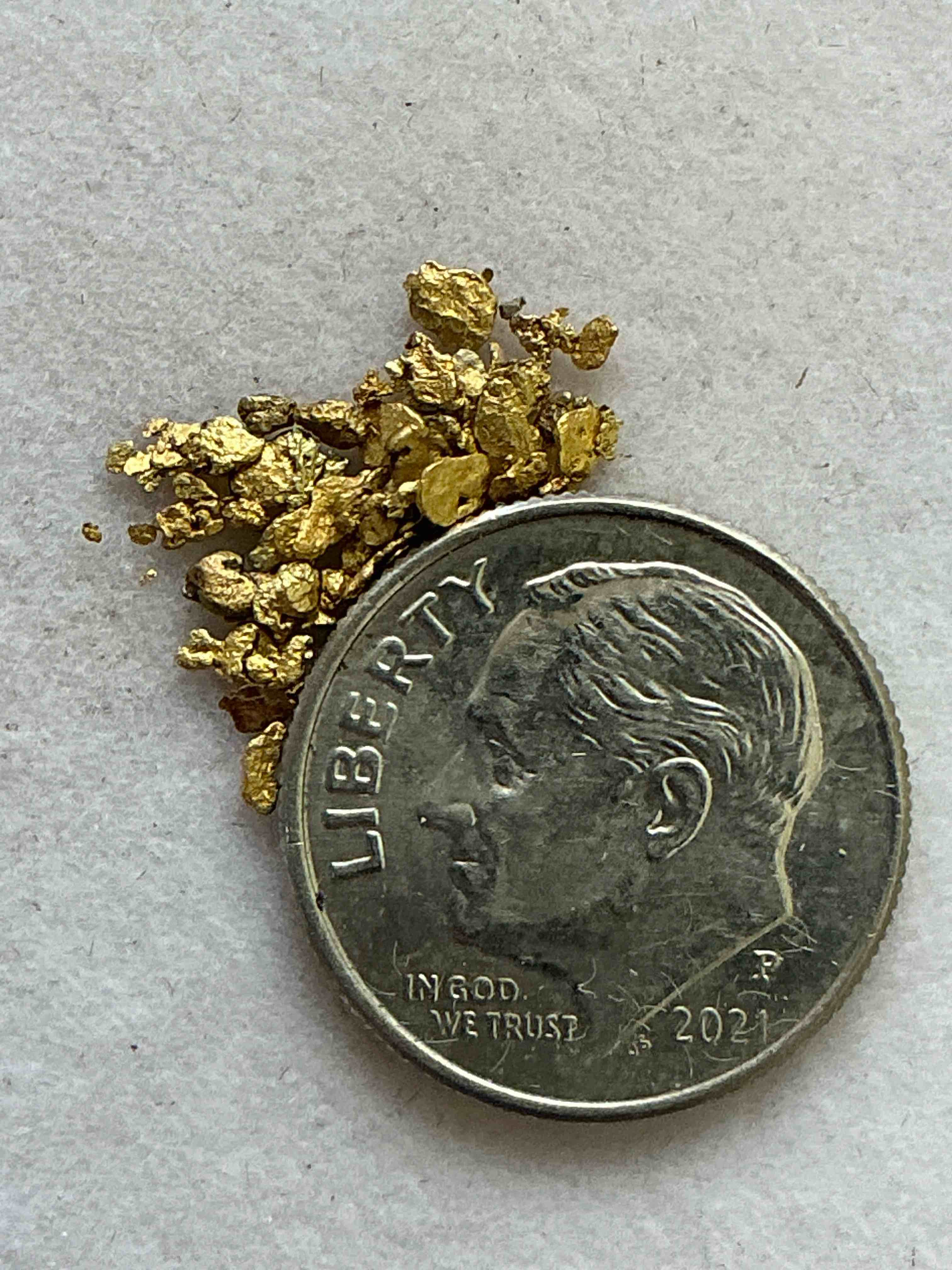gold nugget, authentic! wow! this is a genuine pure gold nugget prospected from fairplay, colorado. approximately 0.1 gm in size/weight. this type of gold in nugget form that has not been processed is extremely hard to find & is much more rare than processed gold in any form. u.s. dime shown in image is for visual size reference only (not included). own an incredibly cool piece of gold & an awesome investment in fine u.s. gold precious metal! every gold nugget is "one of a kind!"