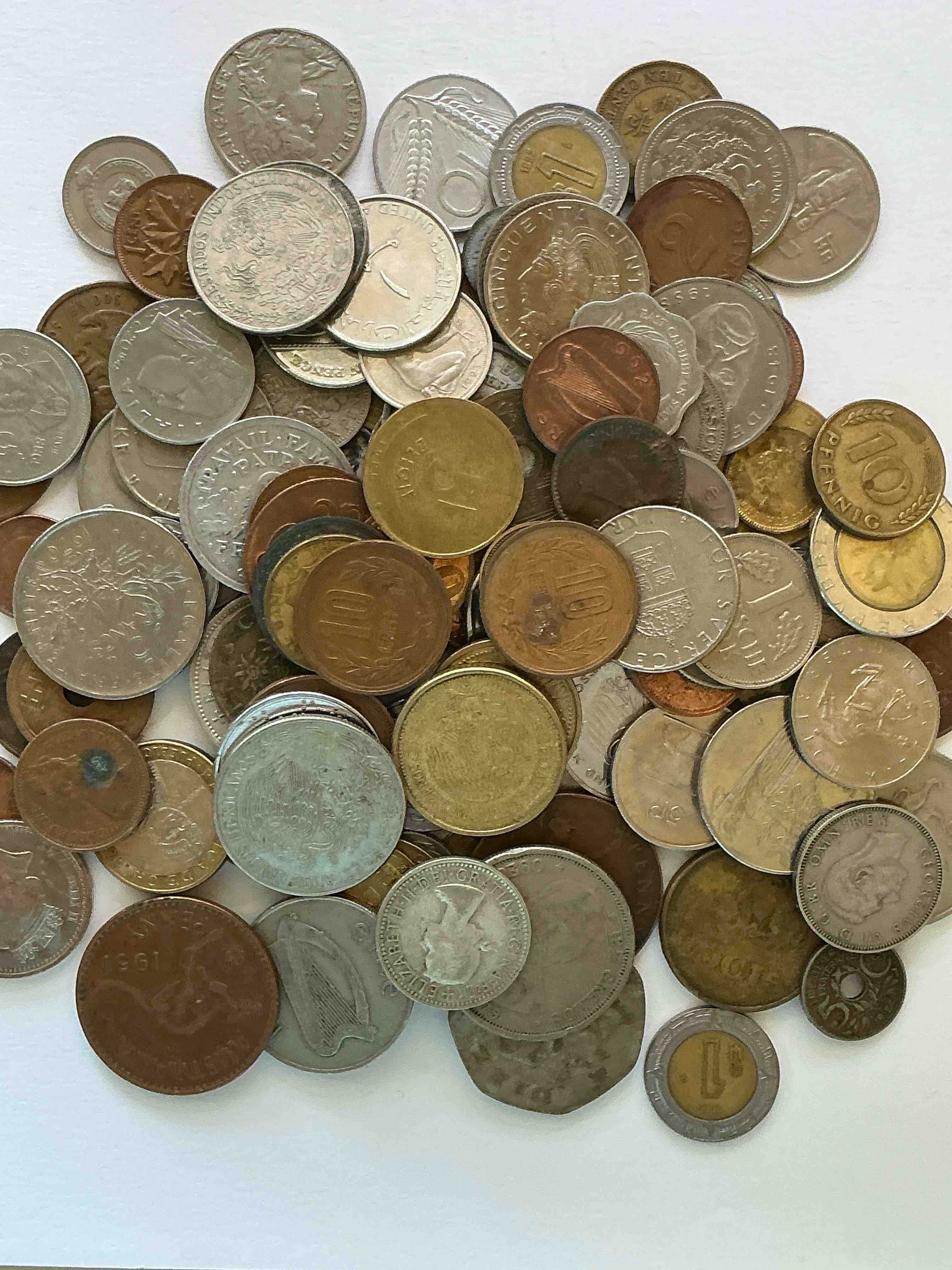 Condition photo showing Good Condition for world coins, antique & vintage! each lot is unique! many different years, countries, sizes & exotic places. this cool collection of antique coins from around the world is loads of fun! have fun identifying each coin & country as a great educational tool! a great investment too!