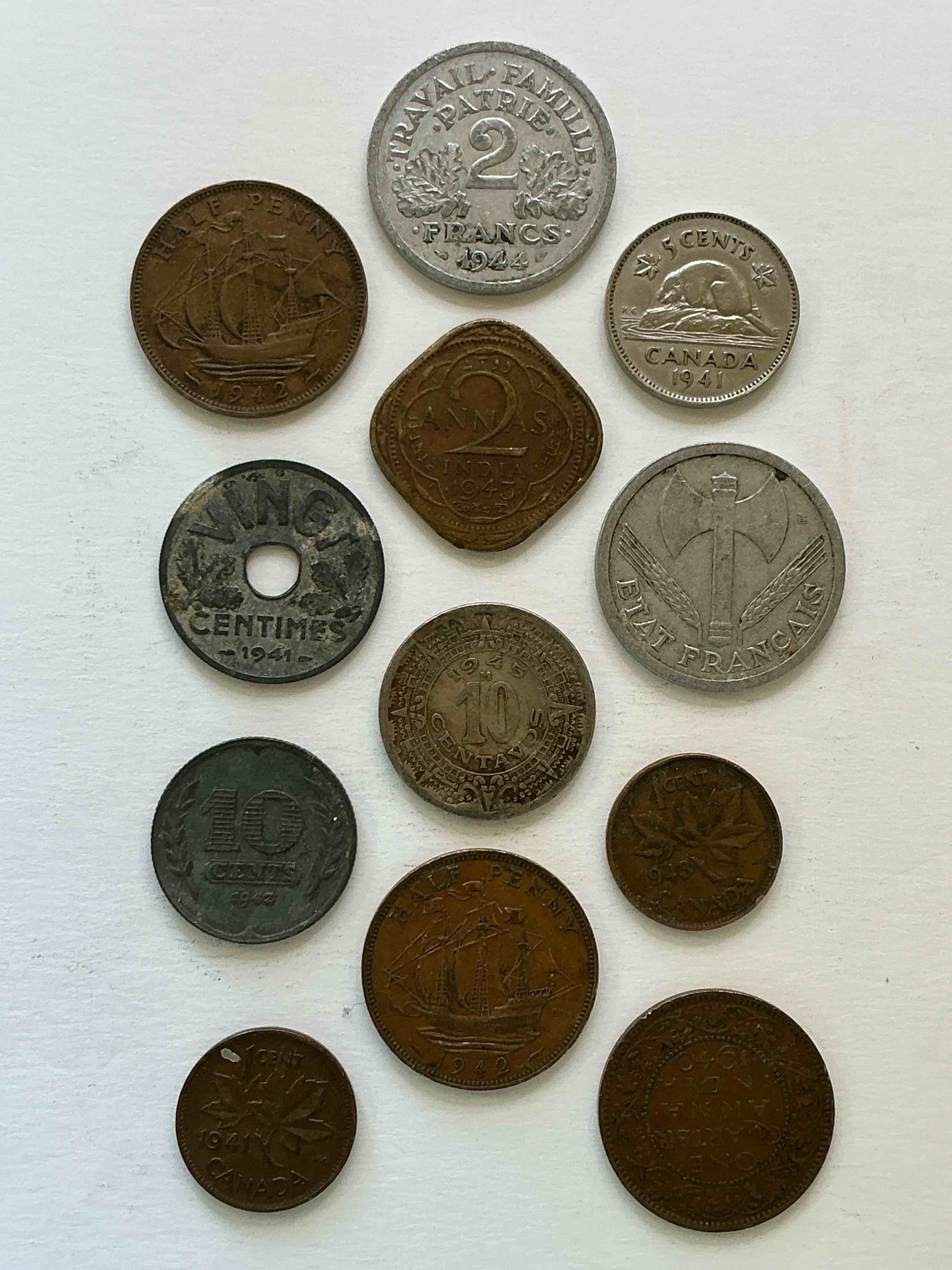 Condition photo showing Good Condition for world war two buffs rejoice! up for auction is an awesome collection of world war ii era coins (1939-1945) from around the world! really hard to collect & find in one place! really cool pieces of history!