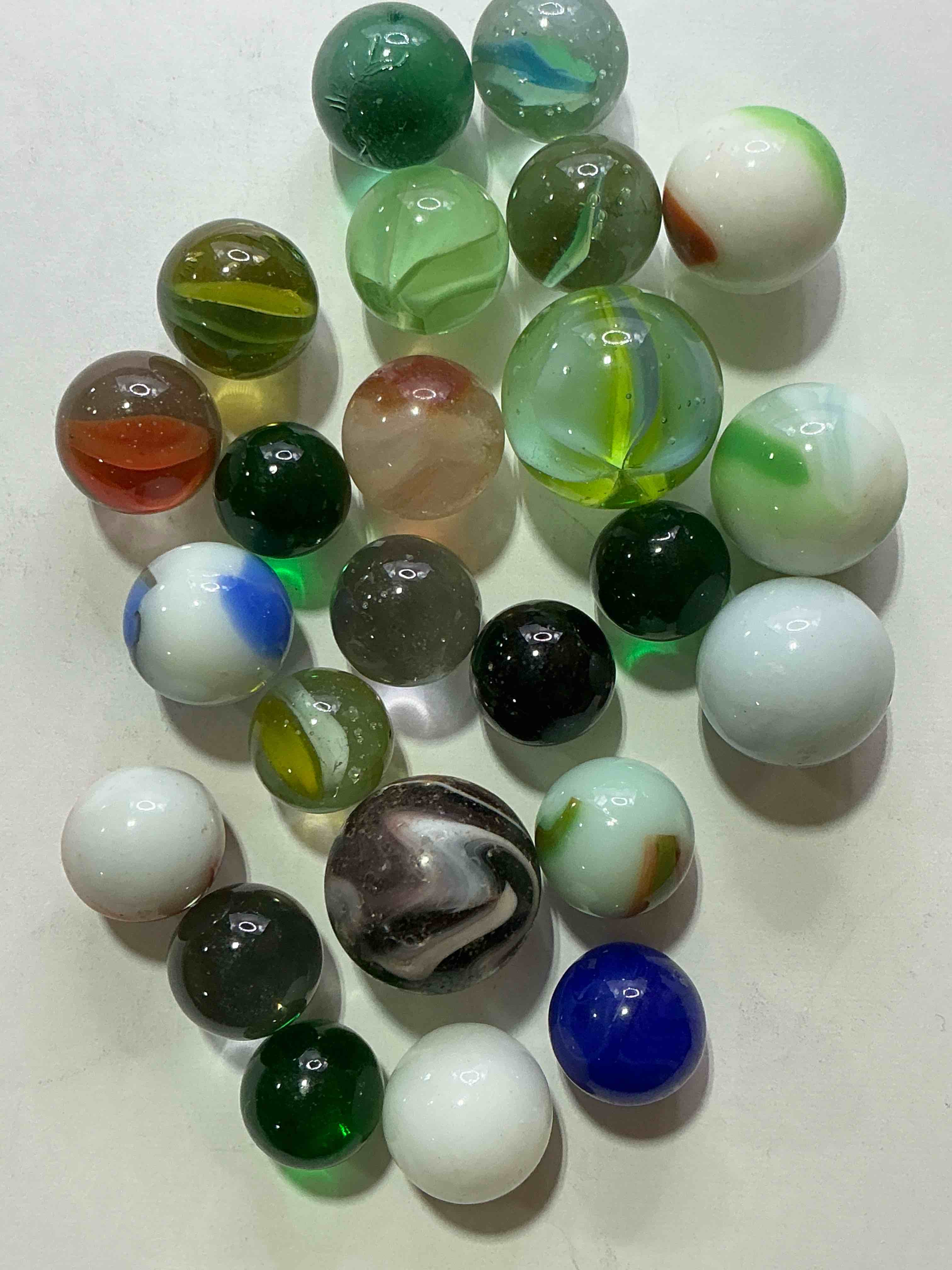 Condition photo showing New/Like New for antique glass marbles! genuine stunning marbles lot, all marbles made between the years 1925-1965 & made with uranium! many are great depression era & even earlier! gorgeous, authentic pieces of history!