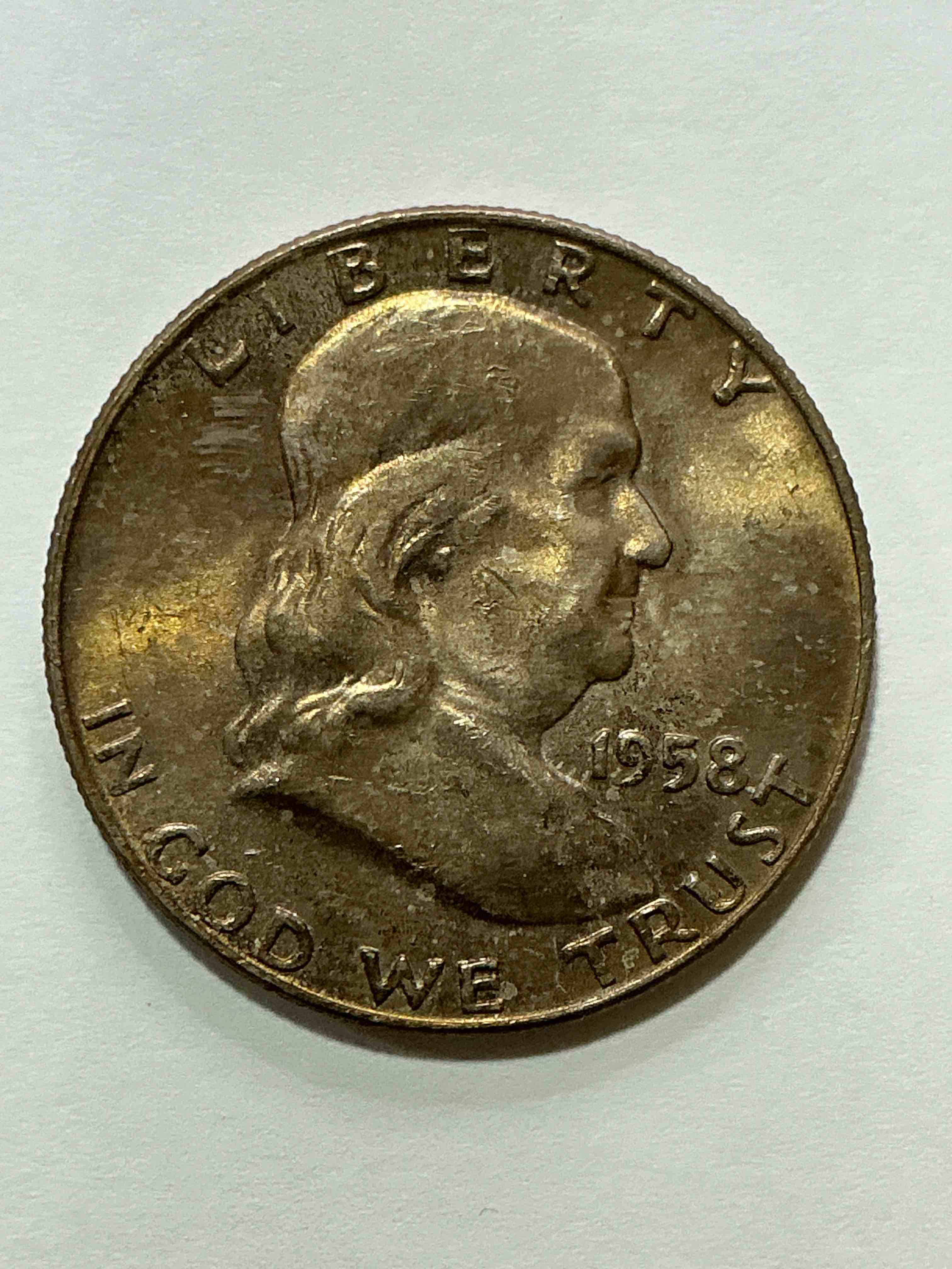 ben franklin silver! pre 1965 silver u.s. half dollar coins! before 1965 american half dollars were actually silver, here is a rare 1958 version in good condition! great for investing in precious metals! these heavy half dollars were minted at 90% silver and 10% copper, giving them a net weight of .36169 ounces of pure silver per coin! very rare in this great. condition!