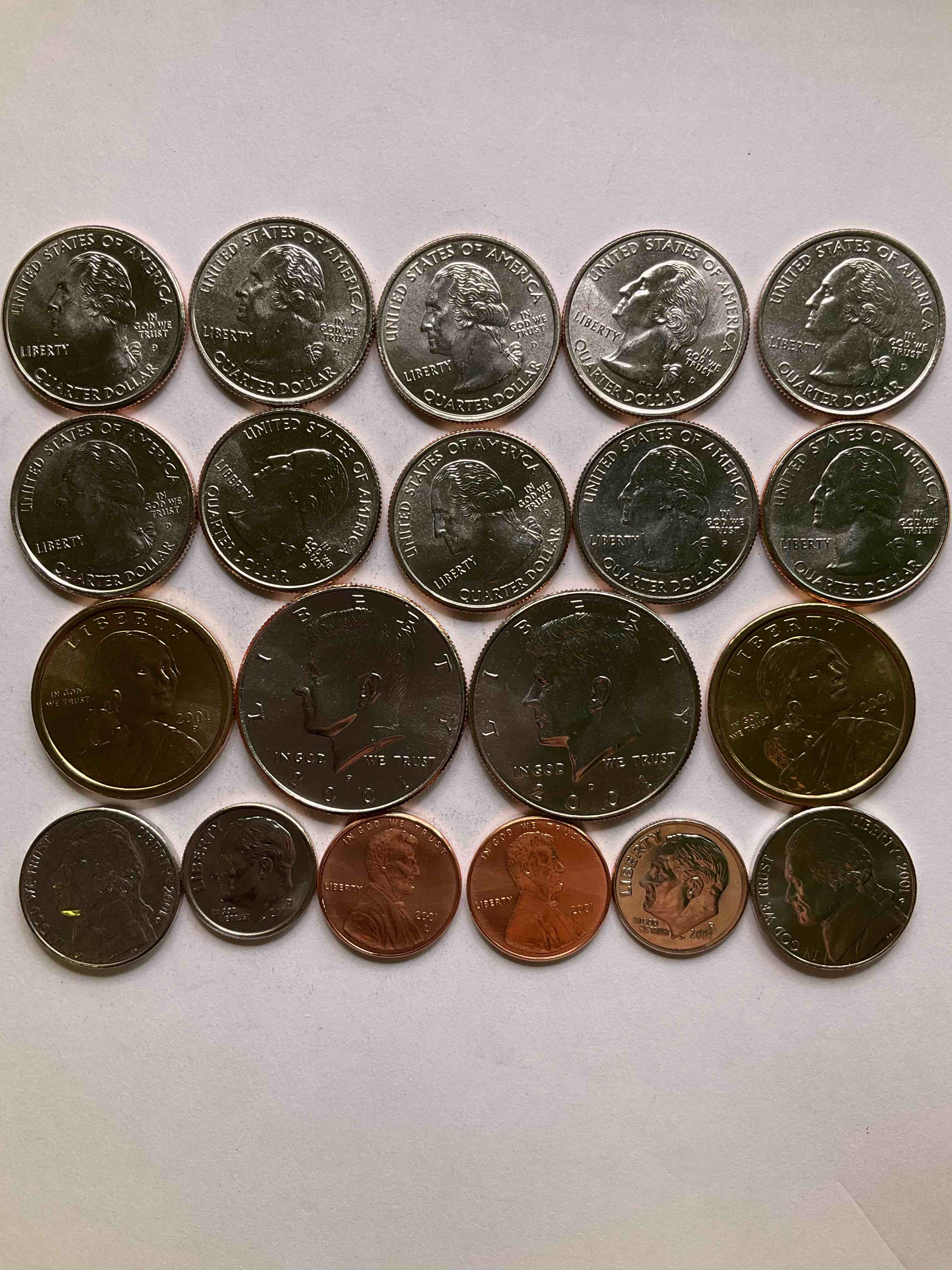 2001, the year the world changed forever. here are gorgeous 2001 u.s. mint  uncirculated coins. includes 20 coins, each coin minted that year to include the 10 state quarters issued that year, philadelphia & denver mints. half dollars, state quarters, one dollar coins & more! own an incredible collector item & an important piece of history.