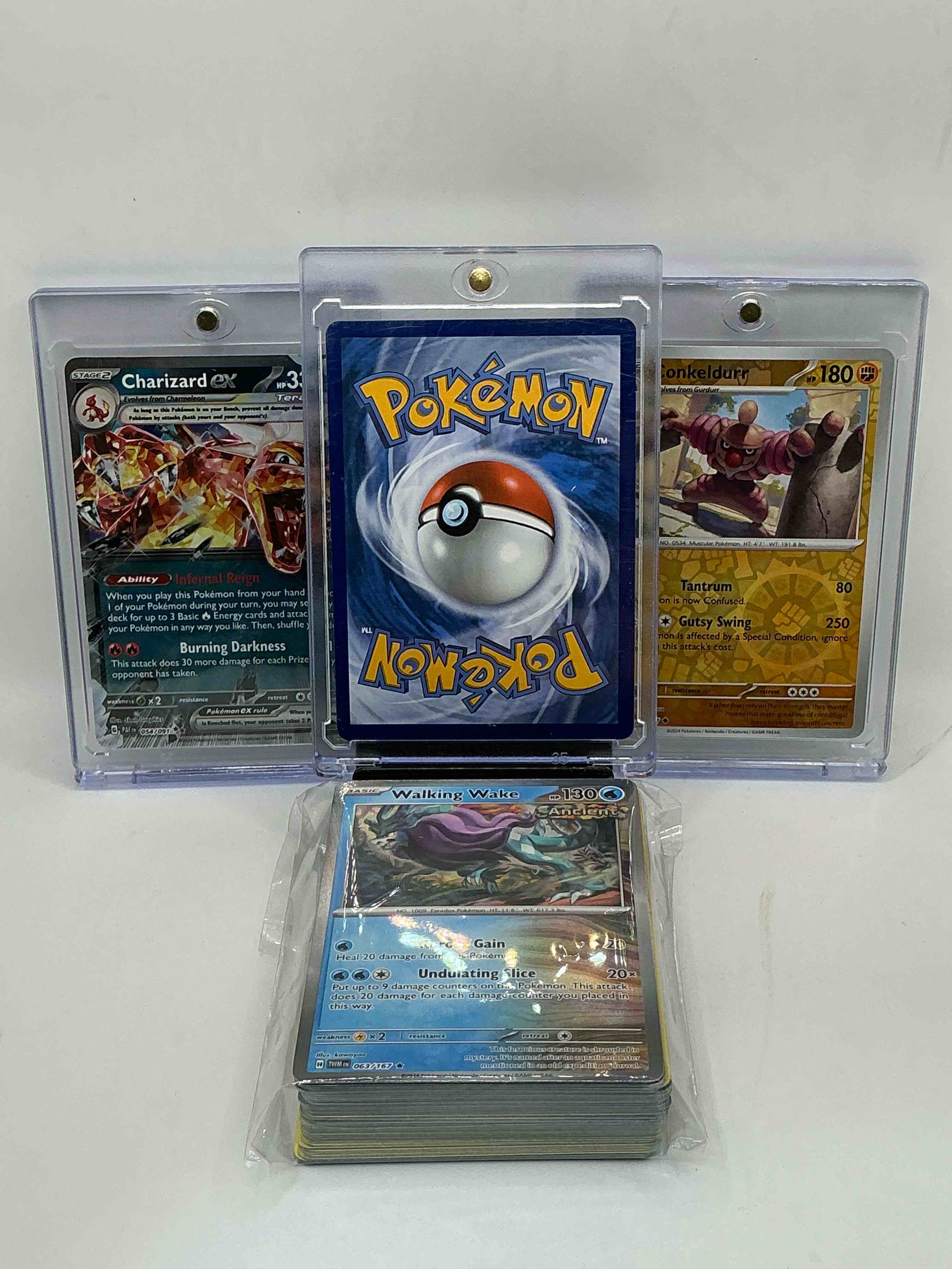 Condition photo showing New/Like New for (set of 50) pokémon palooza! mega lucario ex! charizard ex! conkeldurr! along with other pokémon heroes, holos, legends & commons- including 1 stage two rare holographic, 2 stage one rare holographic, 3 basic rare holographic, 4 common/ uncommon holographics (all stages), 2 stage two non holographic & 2 rares! also includes 36 non holo common/ uncommon basic & first stage cards trainers & energy too! perfect set for collectors & enthusiasts!