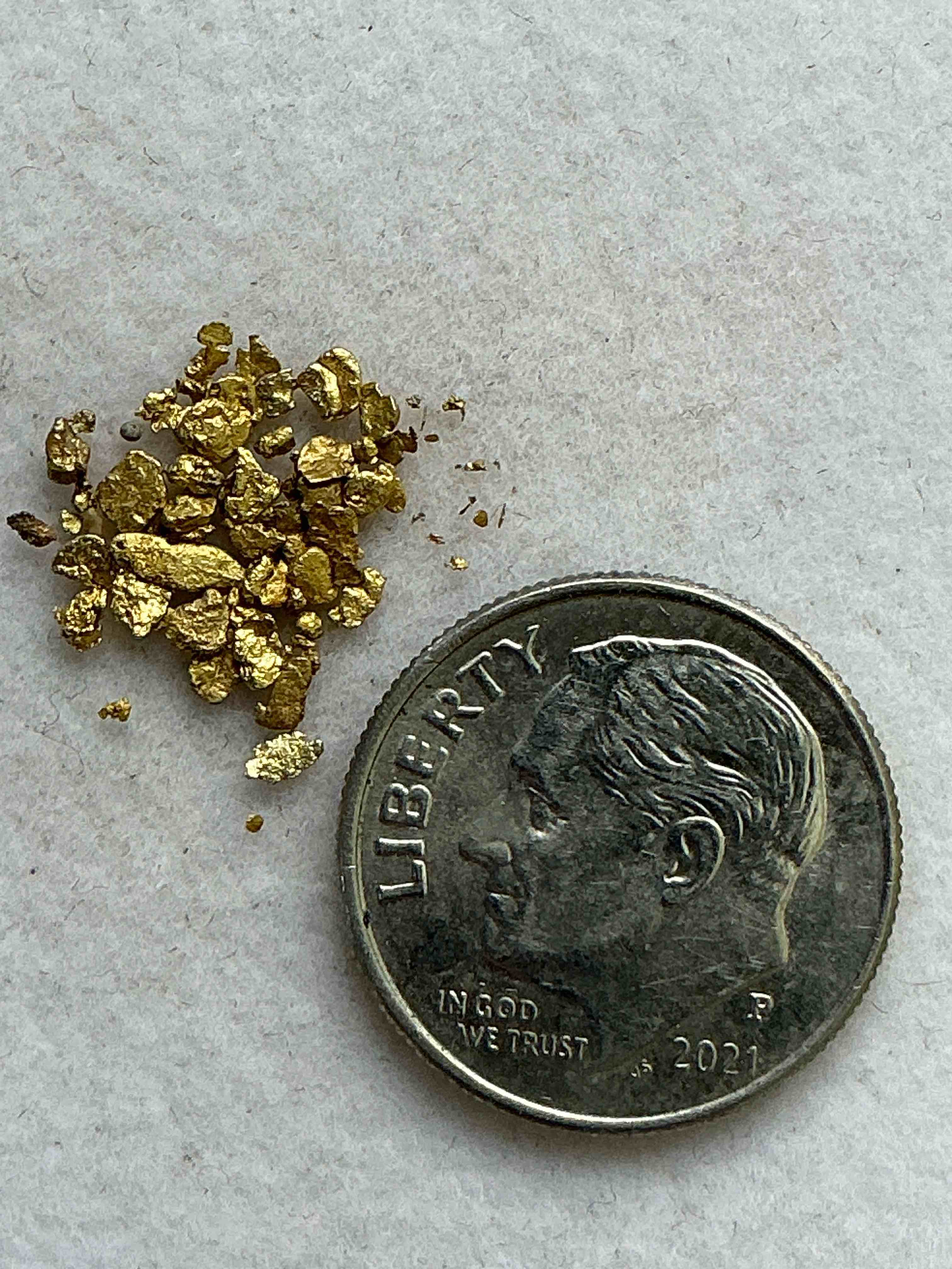 Genuine Gold Nuggets! Gold Nuggets Fresh From Prospecting North Carolina Mountains, Total Weight Of All Nuggets Is Approximately .5 Grams. These Gold Nuggets Typically Test At Between Approx 22-24 Karat. Gold In Raw, Prospected Form Is Extremely Hard To Find & Much Rarer Than Any Refined Form. Get In On The Gold Craze... Gold Has Increased In Value Over 40% Since 2025! U.S. Dime For Size Reference Only (not included). Gold Vile In Image Included. Own Genuine, Gold Nuggets! 