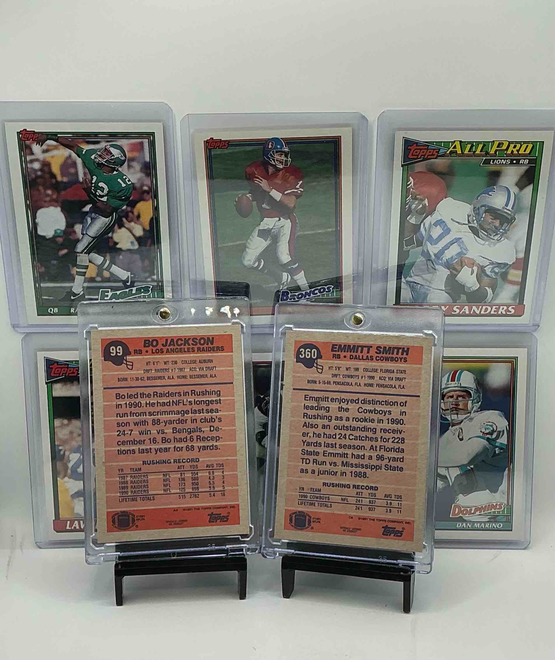 Condition photo showing New/Like New for 1991 topps football! emmitt smith super rookie rookie card, barry sanders card, john elway, dan marino, lawrence taylor, jerry rice & more! 1991 topps football 50 card lot! invest in vintage football!