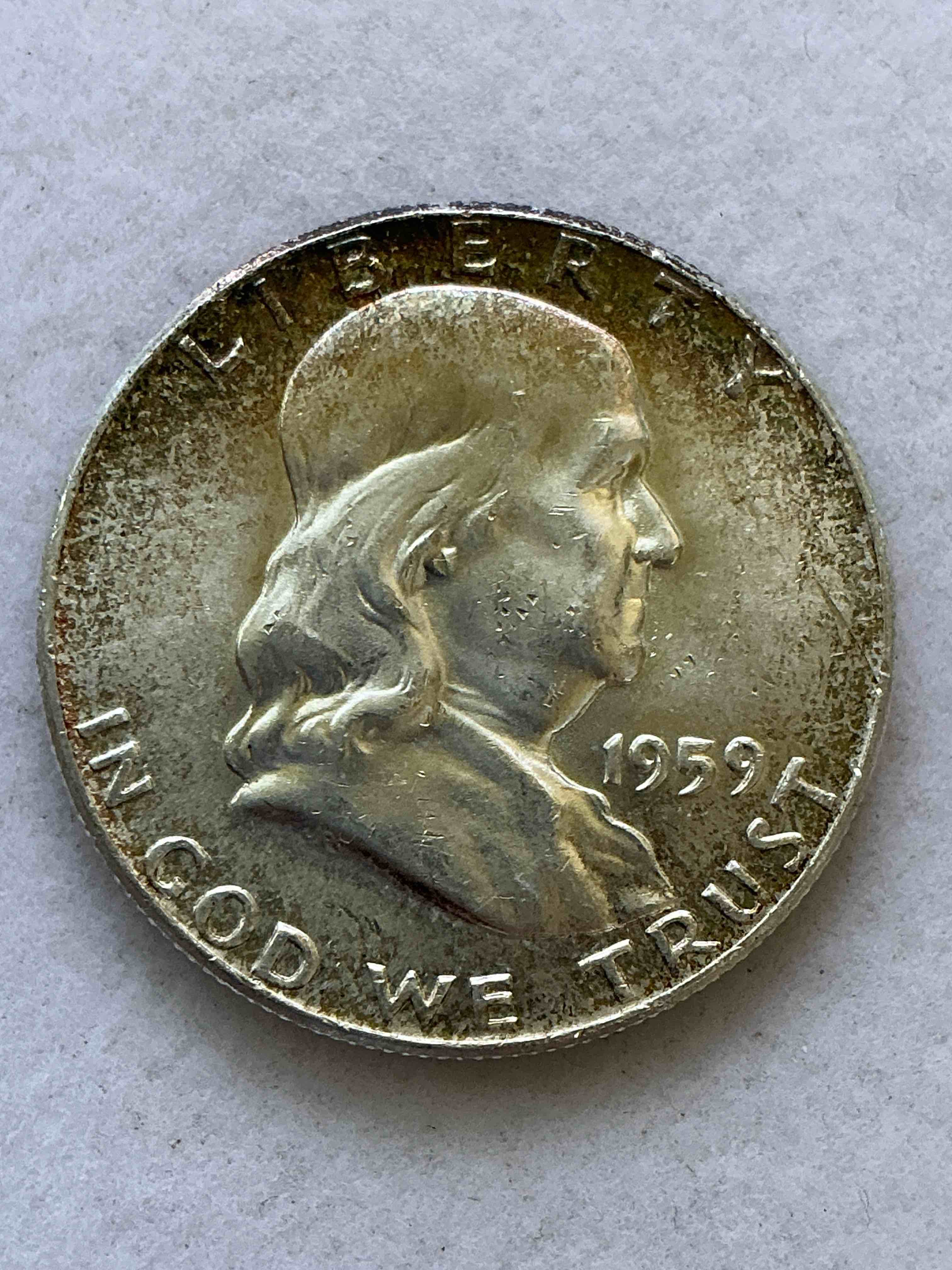 ben franklin silver! pre 1965 silver u.s. half dollar coins! before 1965 american half dollars were actually silver, here is a rare 1959 version in good condition! great for investing in precious metals! these heavy half dollars were minted at 90% silver and 10% copper, giving them a net weight of .36169 ounces of pure silver per coin! very rare in this great condition!