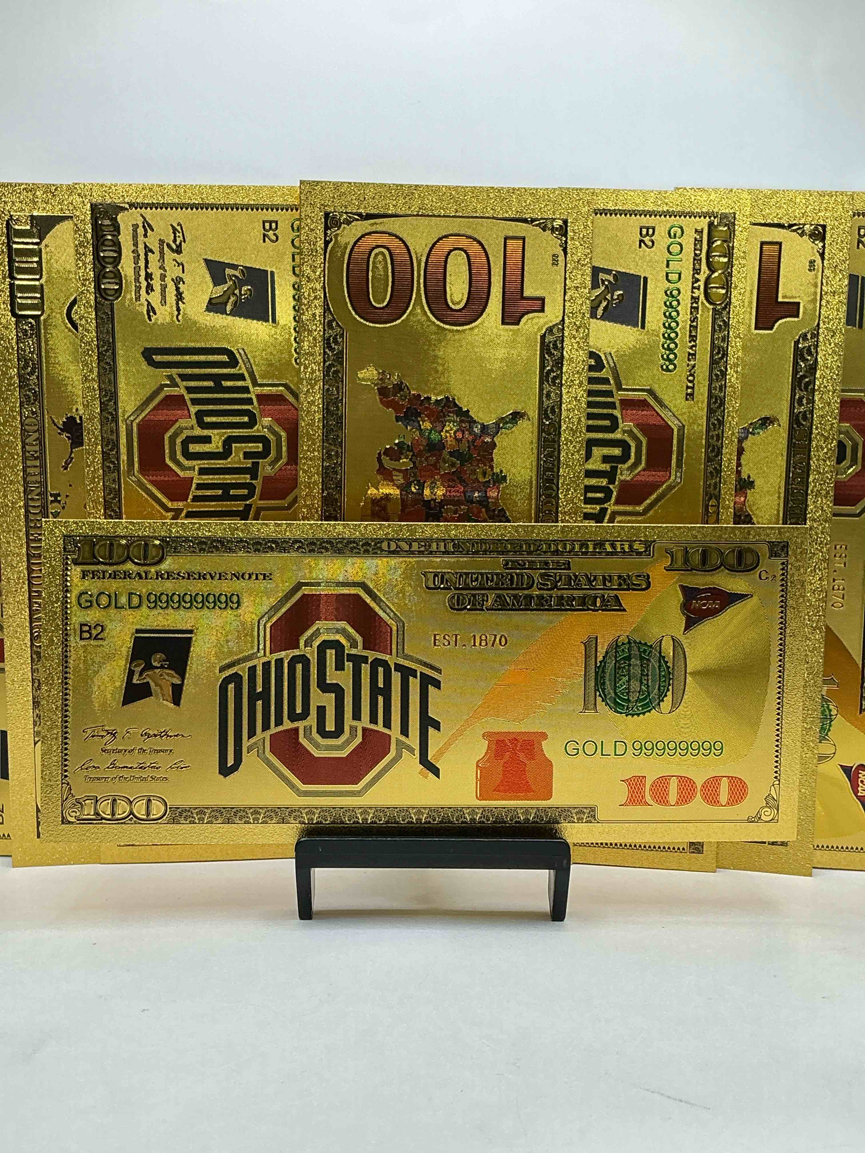 ohio state university collectible memorabilia! super cool, gold in color 100 dollar commemorative ohio state university bill! cool designs on front & back of bill! osu fans rejoice, cool memorabilia! plastic bills with cool designs! 