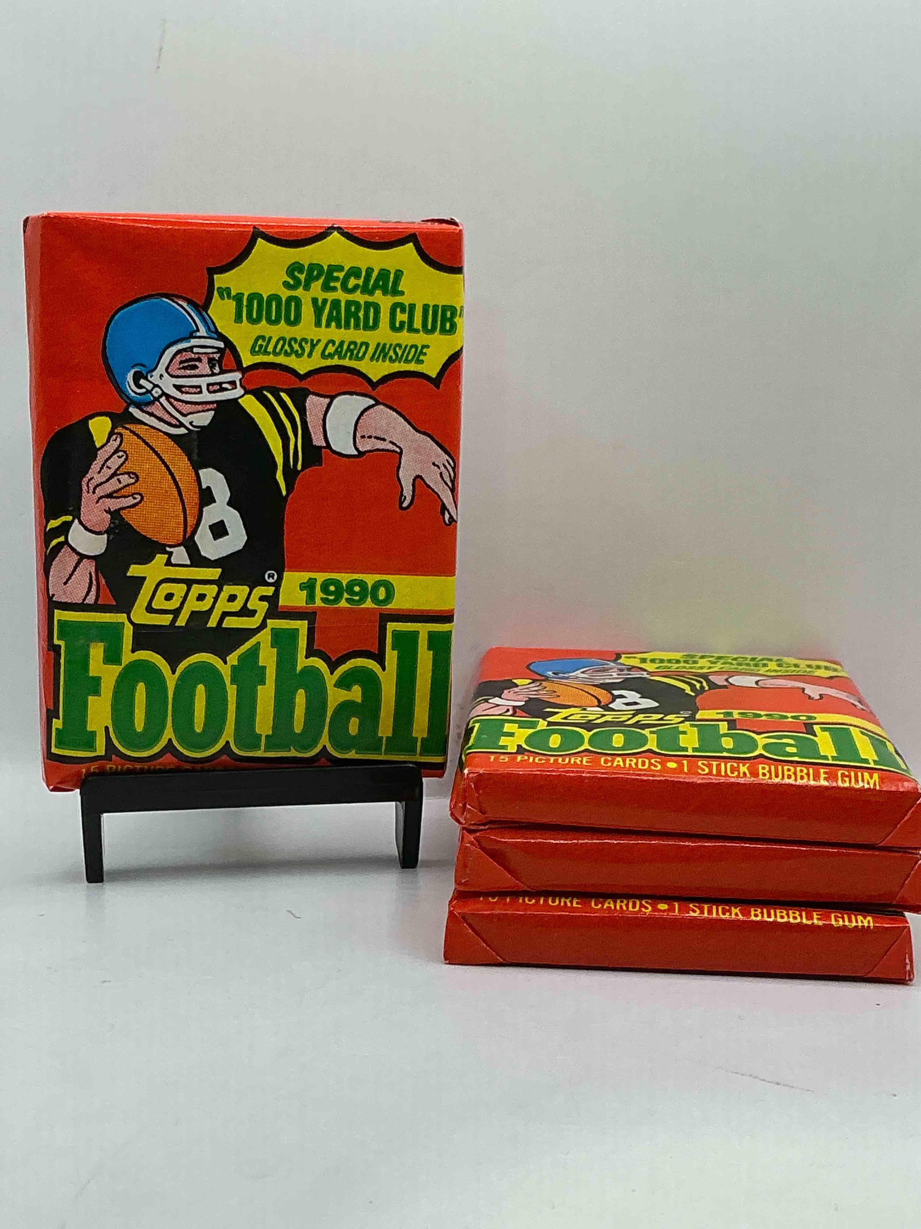 the last year of football wax! joe montana, emmitt smith & barry sanders!? 1990 topps football unopened sports card wax pack, direct from original retail box! getting hard to find! search for early barry sanders & jerry rice & so much more!