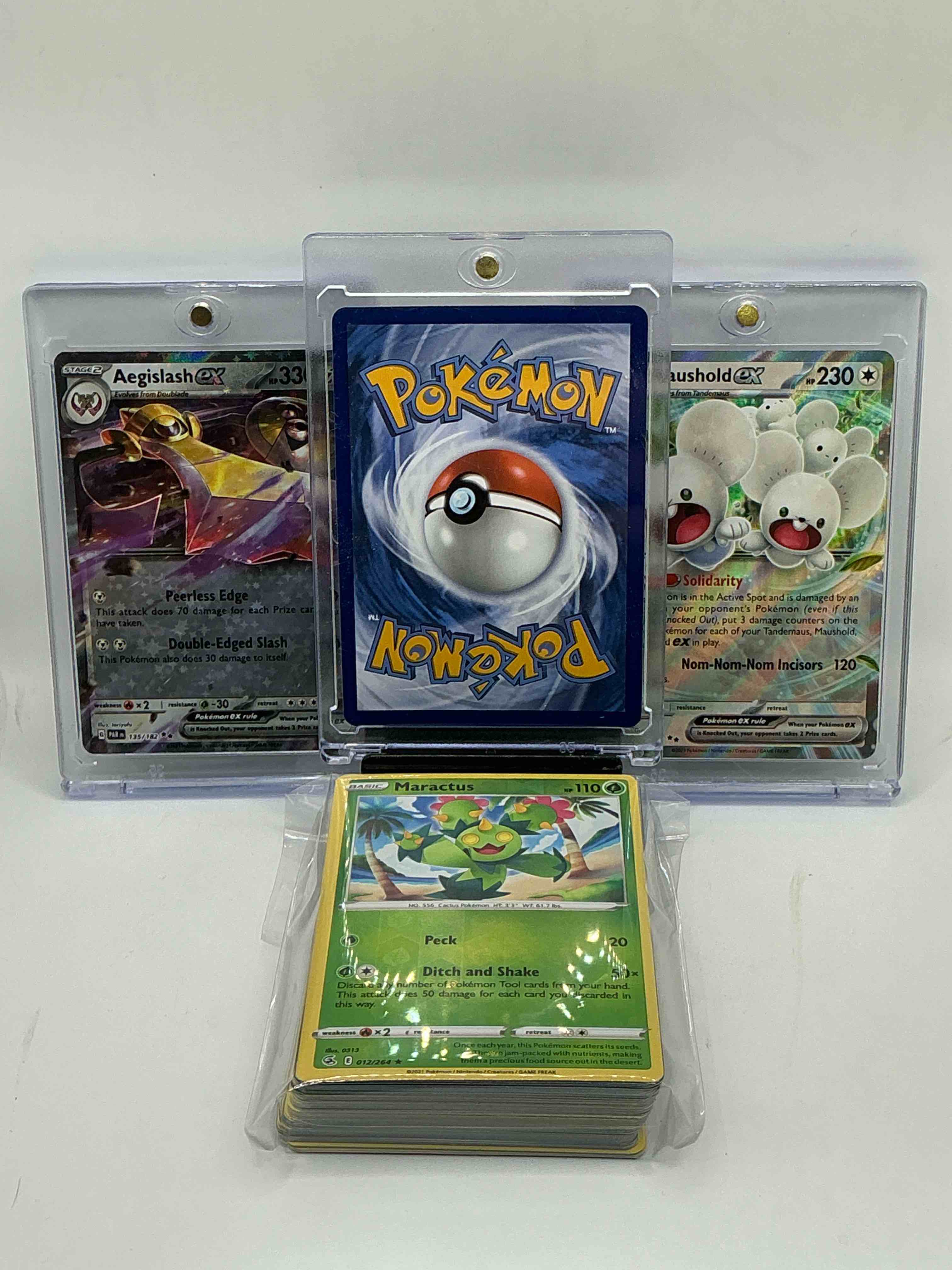 Condition photo showing New/Like New for pokémon palooza! mega charizard x ex! aegislash ex! maushold ex! along with 50 other pokémon heroes, holos, legends & commons- including 1 stage two rare holographic, 2 stage one rare holographic, 3 basic rare holographic, 4 common/ uncommon holographics (all stages), 2 stage two non holographic & 2 rares! also includes 36 non holo common/ uncommon basic & first stage cards trainers & energy too! perfect set for collectors & enthusiasts!
