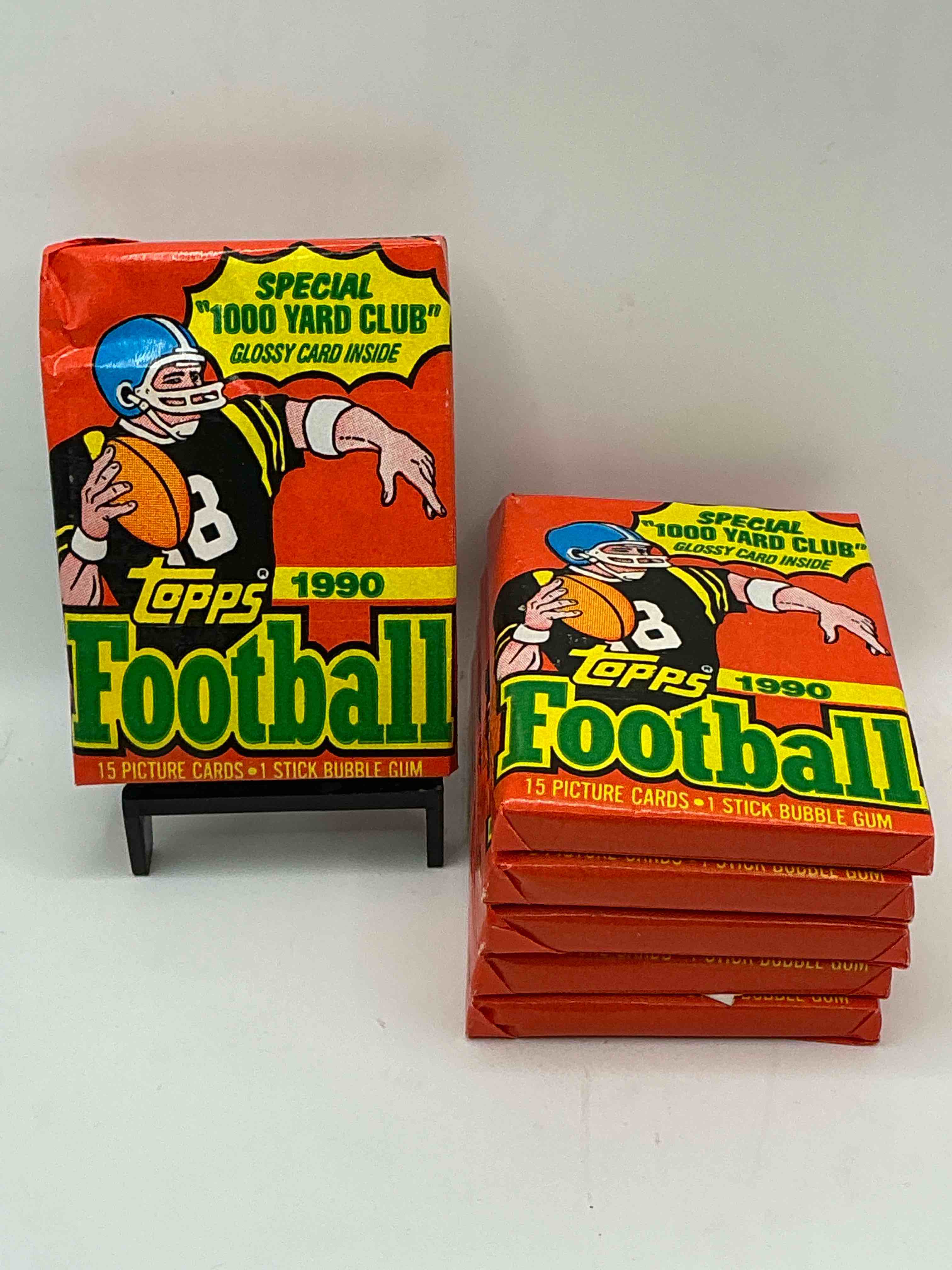 the last year of football wax! joe montana, emmitt smith & barry sanders!? 1990 topps football unopened sports card wax pack, direct from original retail box! getting hard to find! search for early barry sanders & jerry rice & so much more!