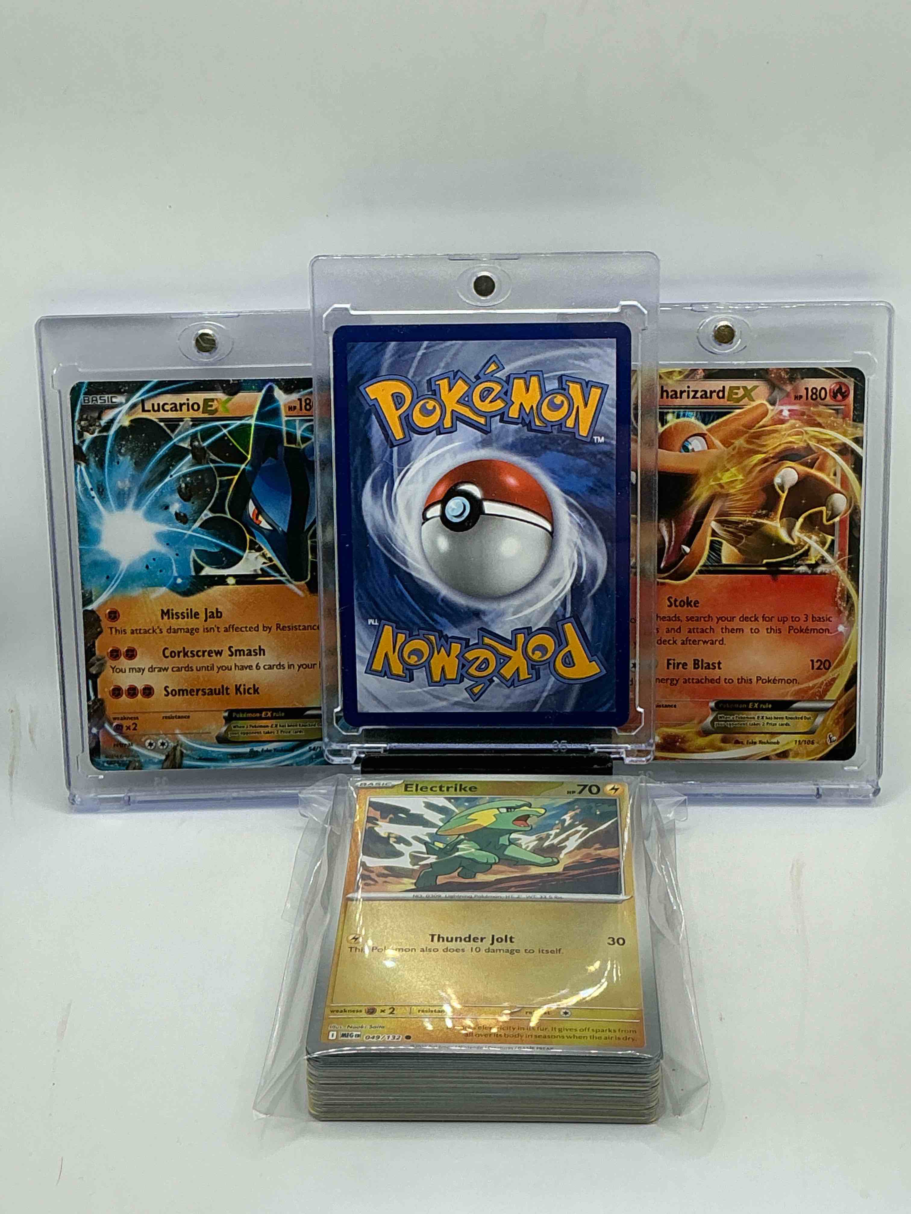 Condition photo showing New/Like New for pokémon palooza! team rocket’s mewtwo ex! lucario ex! charizard ex! along with 50 other pokémon heroes, holos, legends & commons- including 1 stage two rare holographic, 2 stage one rare holographic, 3 basic rare holographic, 4 common/ uncommon holographics (all stages), 2 stage two non holographic & 2 rares! also includes 36 non holo common/ uncommon basic & first stage cards trainers & energy too! perfect set for collectors & enthusiasts!