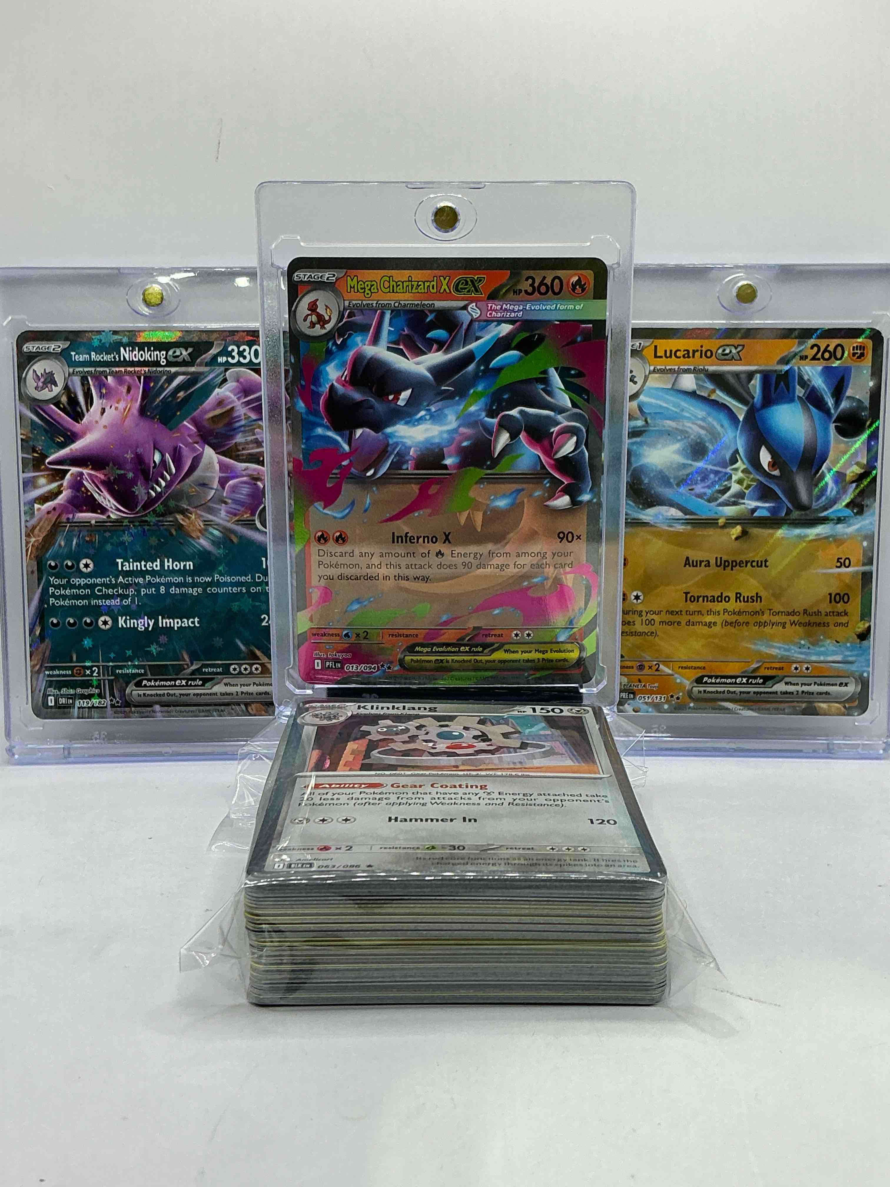 pokémon palooza! mega charizard ex, lucario ex & nidoking ex & more! wow! along with 50 other pokémon heroes, holos, legends & commons- including 1 stage two rare holographic, 2 stage one rare holographic, 3 basic rare holographic, 4 common/ uncommon holographics (all stages), 2 stage two non holographic & 2 rares! also includes 36 non holo common/ uncommon basic & first stage cards trainers & energy too! perfect set for collectors & enthusiasts!