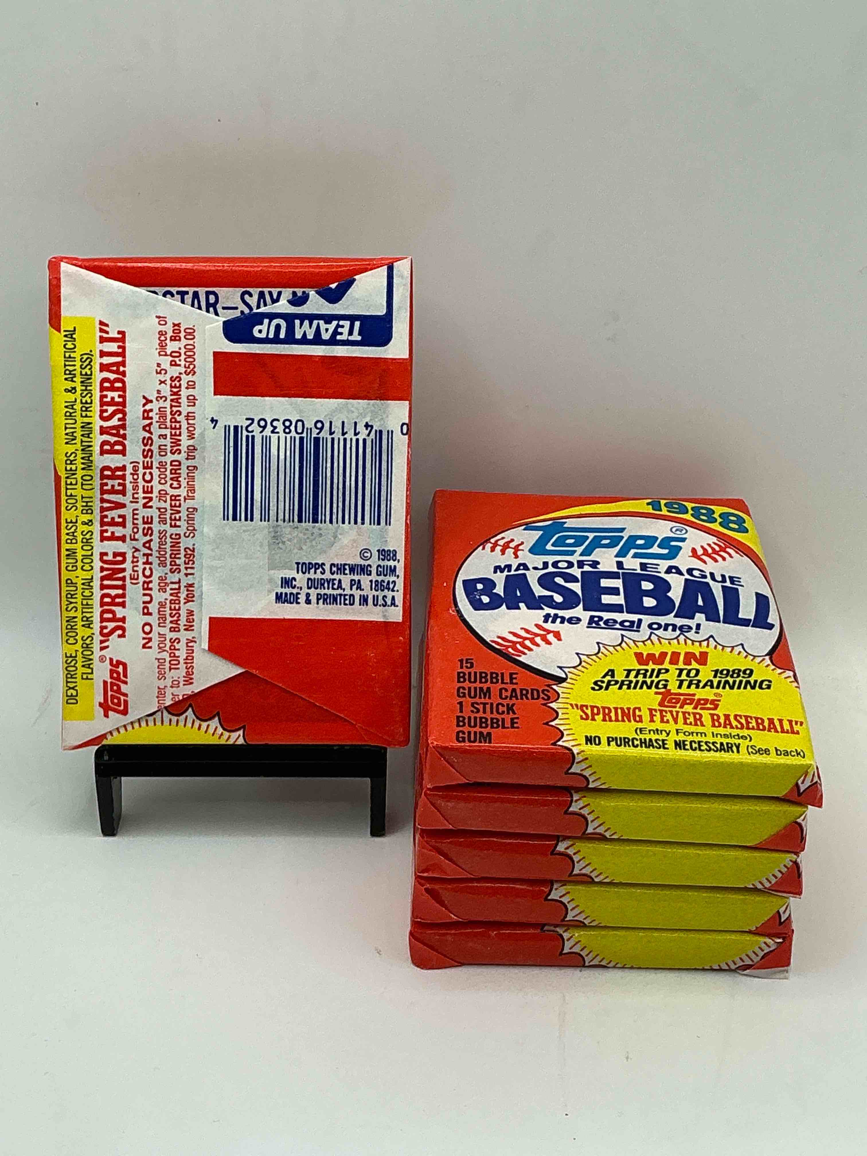 Condition photo showing New/Like New for 80's baseball fan's rejoice! 1988 topps baseball unopened wax packs full of collectible trading cards! search for valuable don mattingly "world of baseball" & nolan ryan cards worth hundreds in perfect condition!